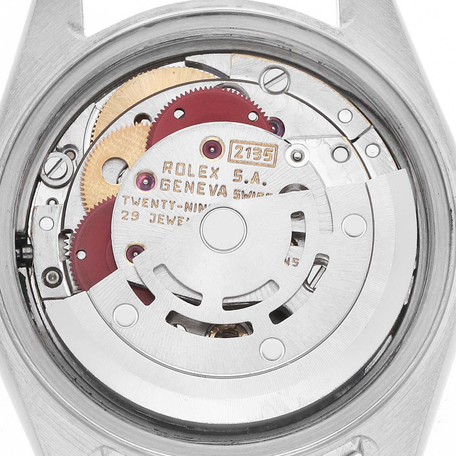 The image shows the back view of a Rolex Datejust 69173 Women
s Steel and Gold (two tone) Black Dial, highlighting the movement and rotor inside the casing.
