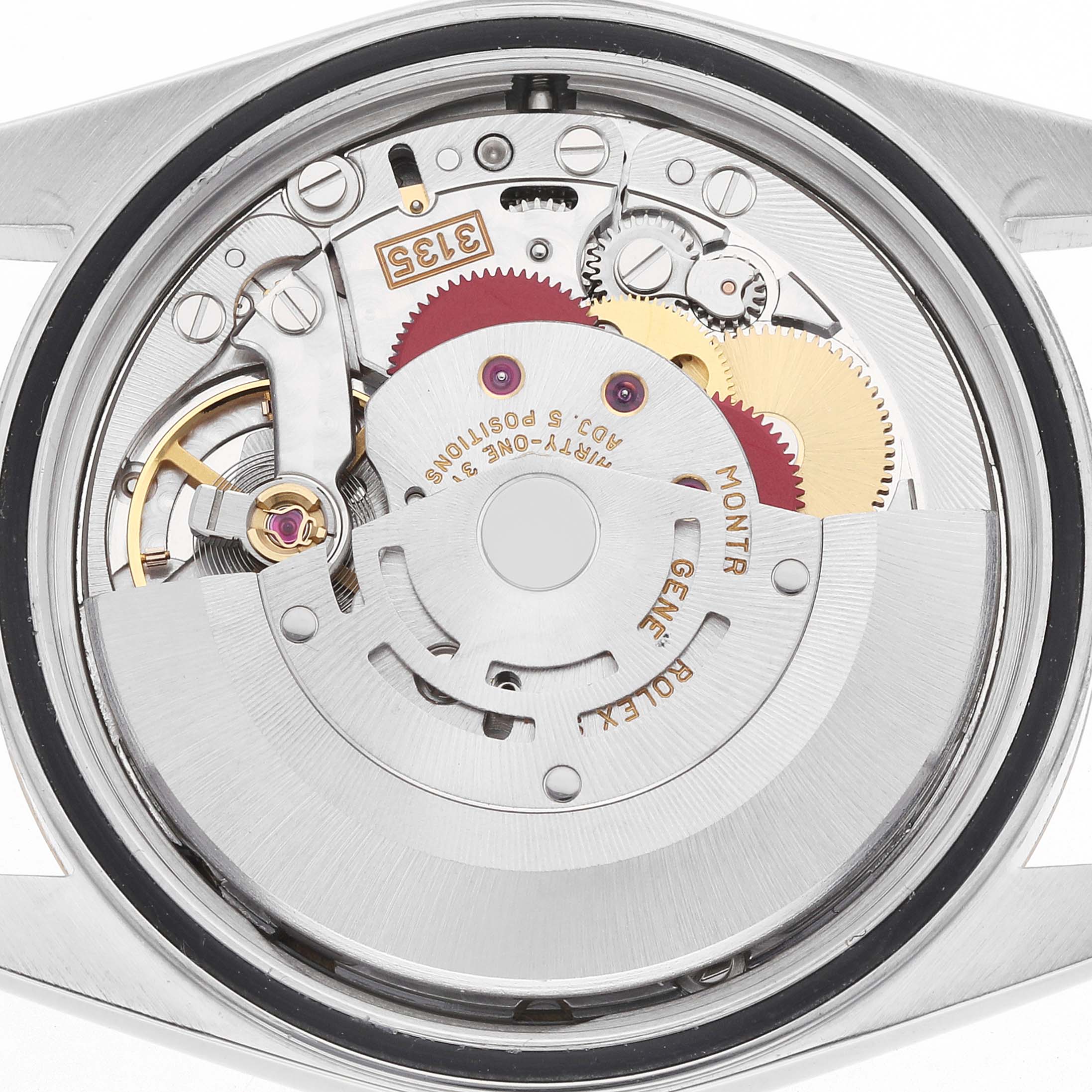 The image shows the Rolex Datejust 16233 Men
s Steel and Gold (two tone) Mother of Pearl Dial
s movement from a top-down angle, highlighting gears and the rotor.