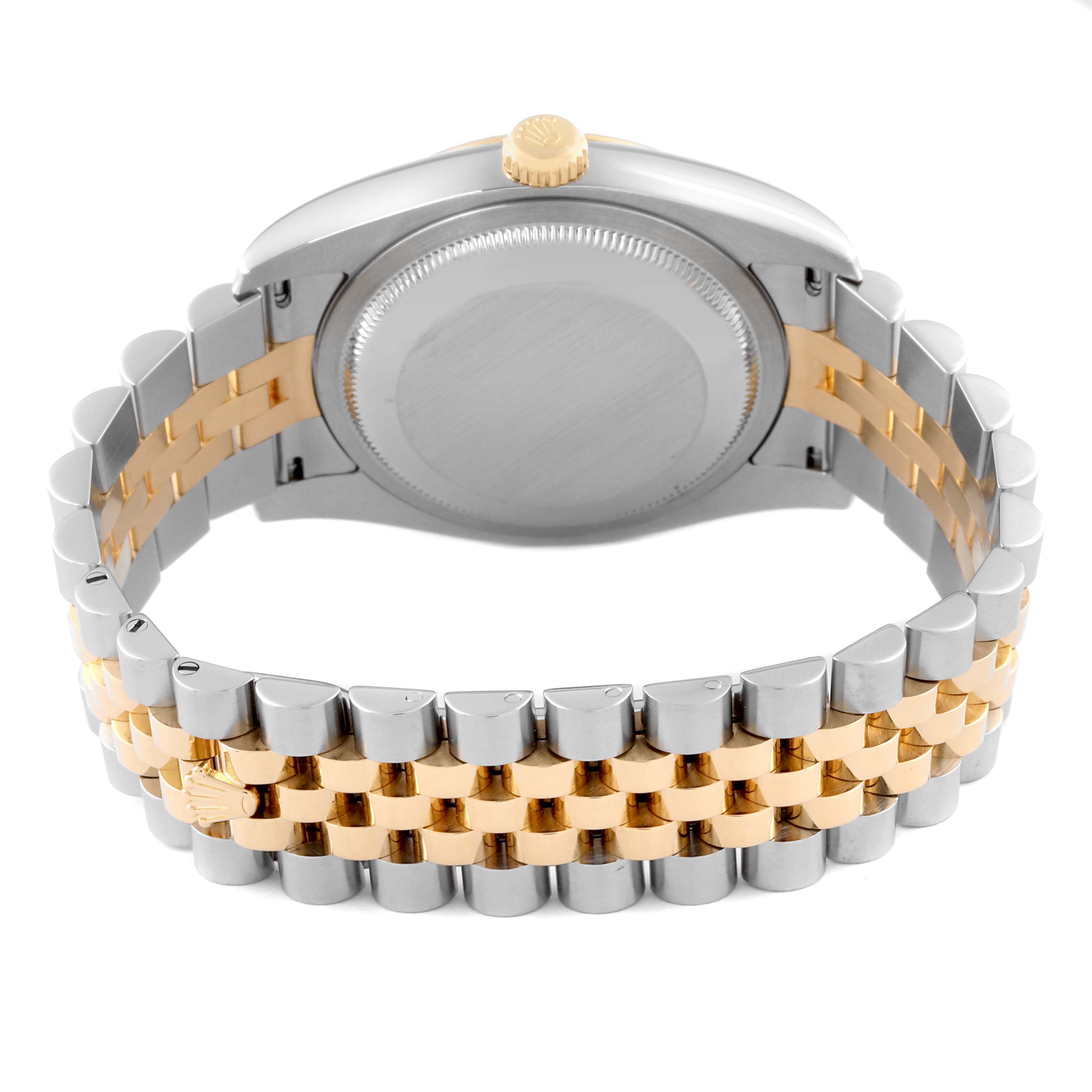 The image shows the back case and jubilee bracelet of a Rolex Datejust 116233 Men
s Steel and Gold (two tone) Silver Dial 116233 Men
s Steel and Gold (two tone) Silver Dial watch from a rear angle.