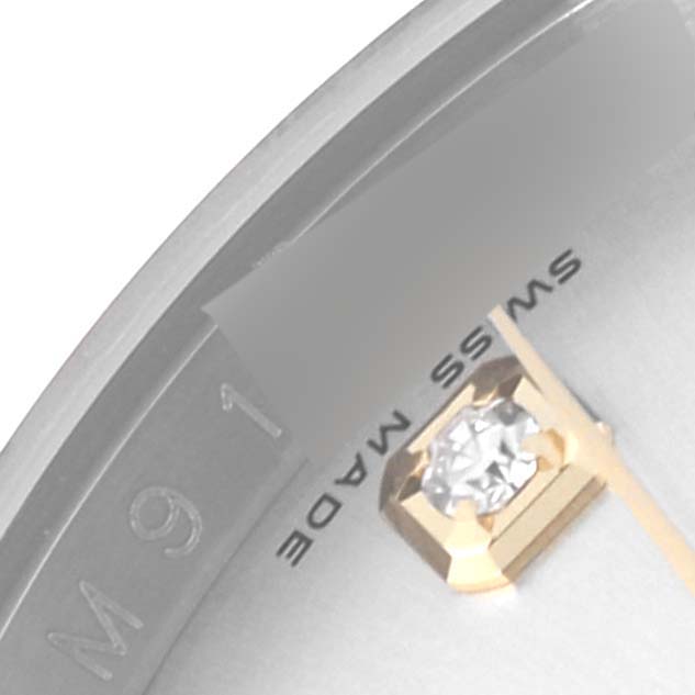 The image shows a close-up of the Rolex Datejust 116233 Men
s Steel and Gold (two tone) Silver Dial 116233 Men
s Steel and Gold (two tone) Silver Dial watch dial with an index marker and "SWISS MADE" text.