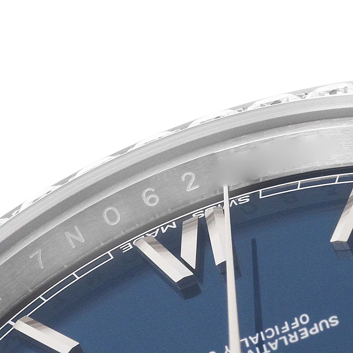 The image shows a close-up of the dial, bezel, and part of the serial number on a Rolex President 228349RBR Men's White Gold Blue Dial 228349RBR Men's White Gold Blue Dial model.