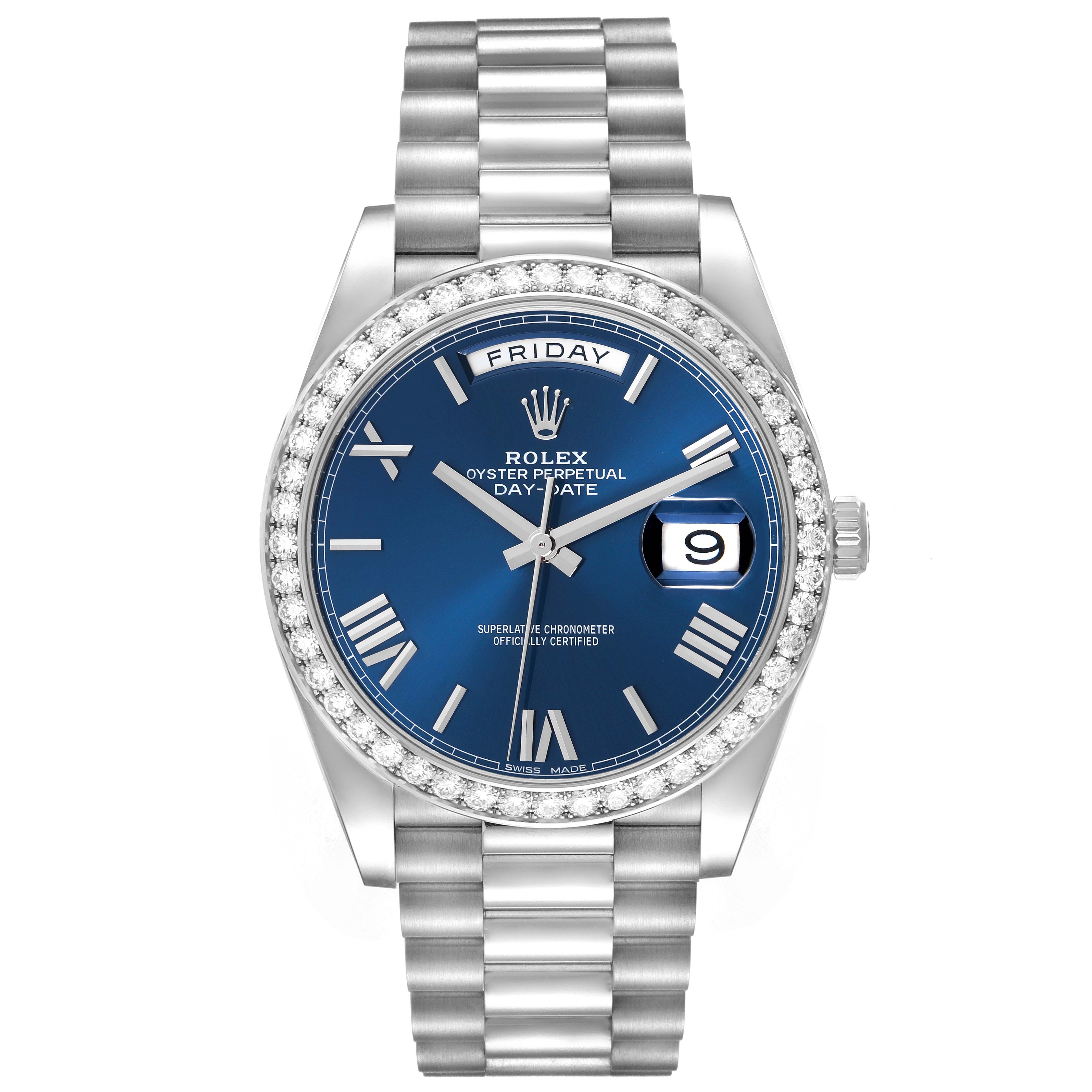 This Rolex President 228349RBR Men's White Gold Blue Dial 228349RBR Men's White Gold Blue Dial model watch is shown from a top-down view, highlighting its blue dial, day and date displays, and metal bracelet.