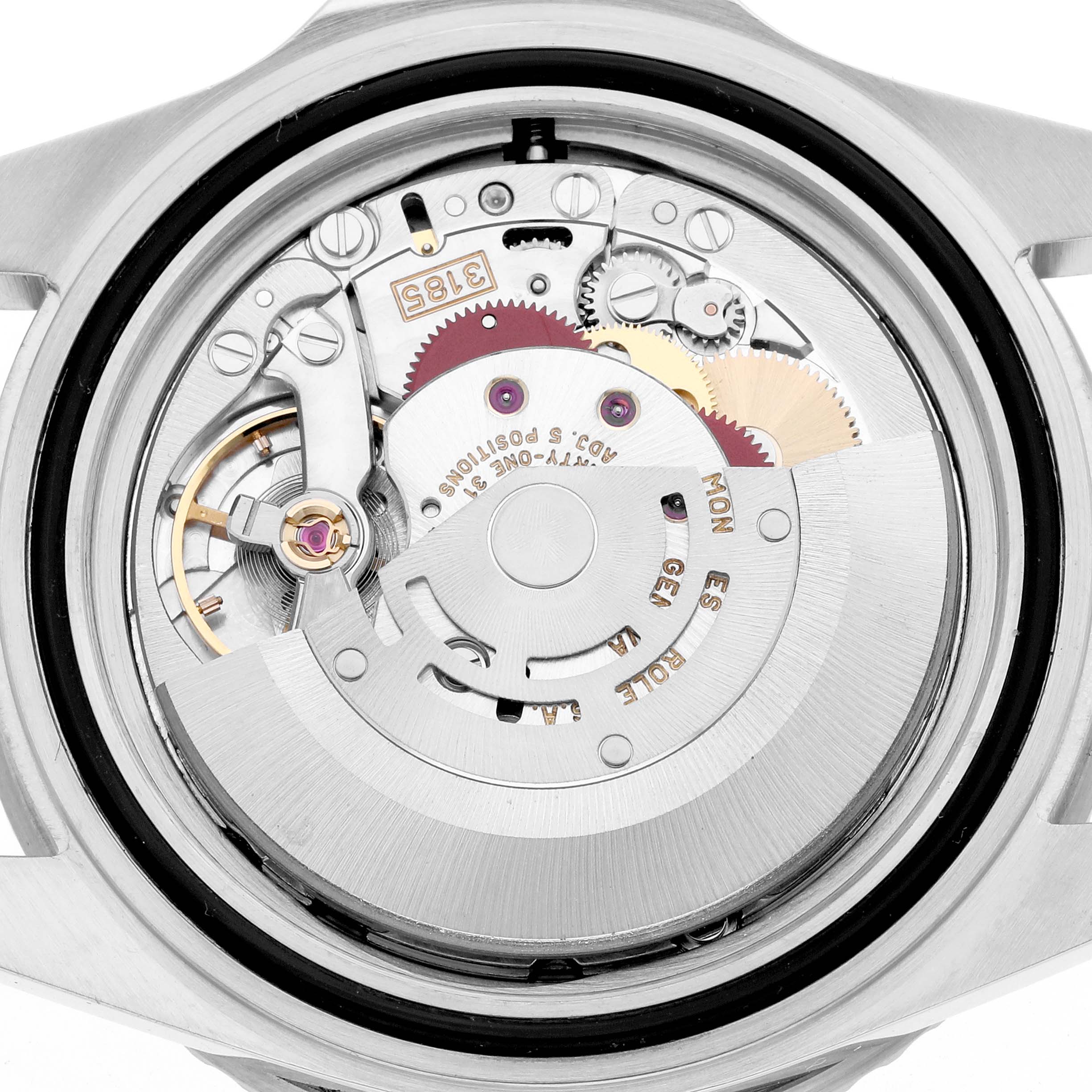 The image shows the back view of a Rolex GMT-Master 16710 Men
s Stainless Steel Black Dial, highlighting its intricate movement components.