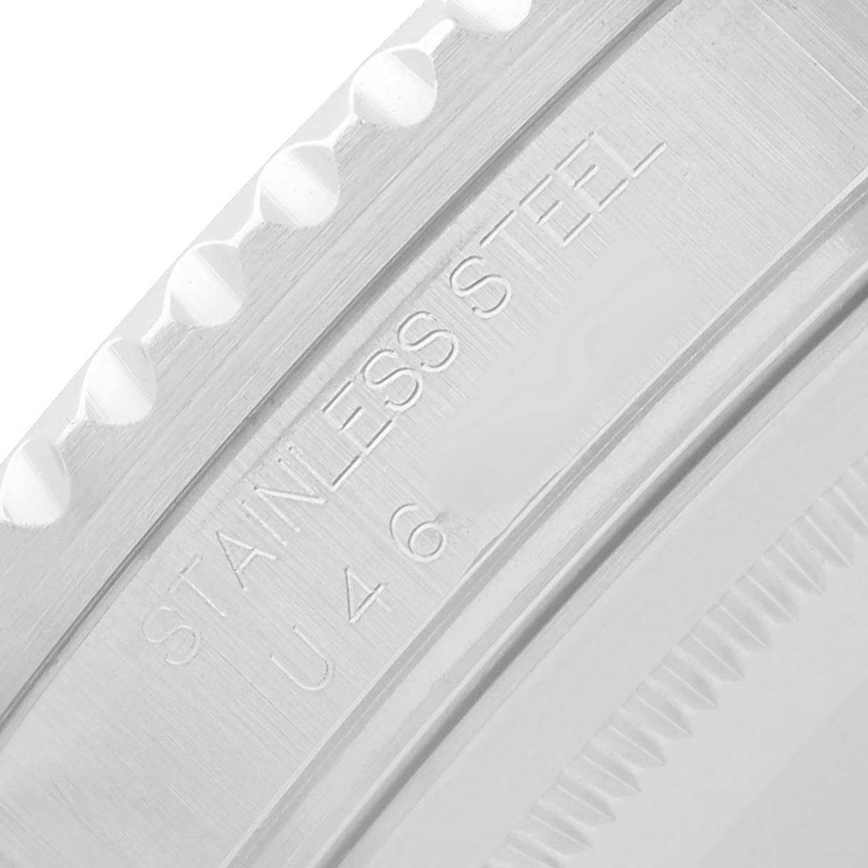 The image shows a close-up of the bezel edge with engraved text on the side of the Rolex GMT-Master 16710 Men
s Stainless Steel Black Dial watch case in stainless steel.