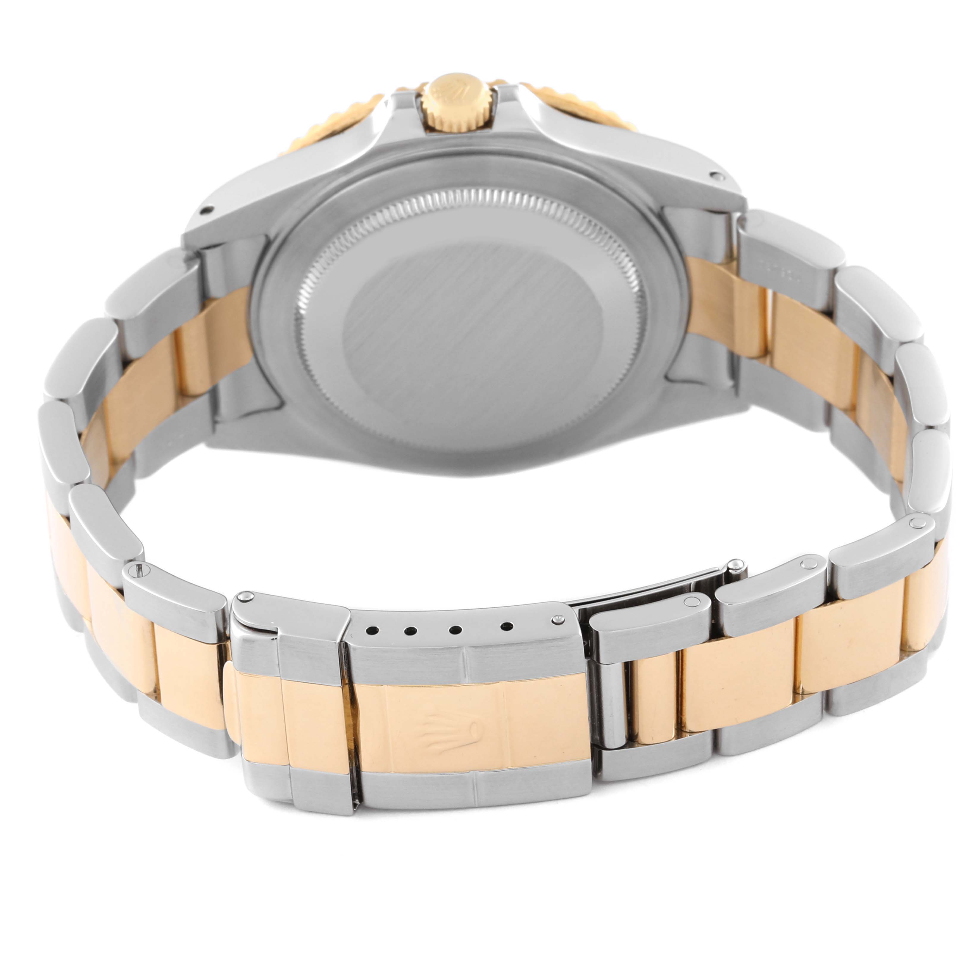 The image shows the back and side of a Rolex GMT-Master 16713 Men's Steel and Gold (two tone) Brown Dial 16713 Men's Steel and Gold (two tone) Brown Dial watch, focusing on the case back and two-tone metal bracelet.