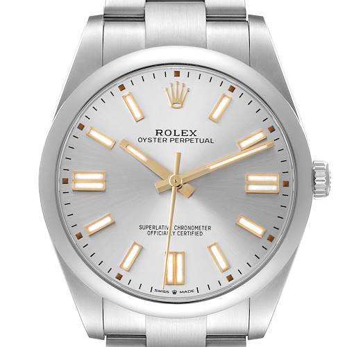 The image shows a front view of the Rolex Oyster Perpetual watch, displaying its silver dial, hands, markers, and part of the bracelet.