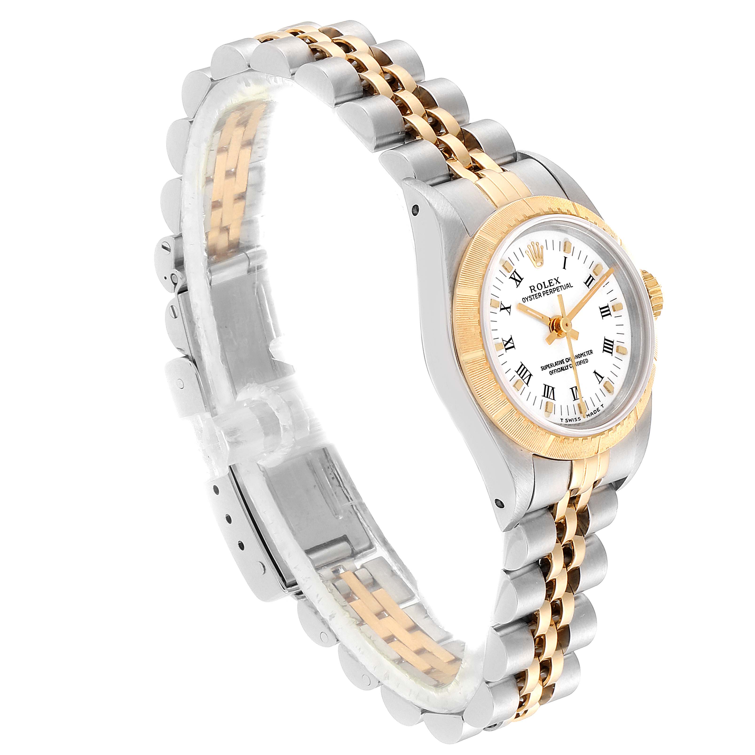 The Rolex Oyster Perpetual 67243 Women's Steel and Gold (two tone) White Dial 67243 Women's Steel and Gold (two tone) White Dial watch is shown at a three-quarter angle, highlighting the watch face, bezel, and two-tone bracelet.