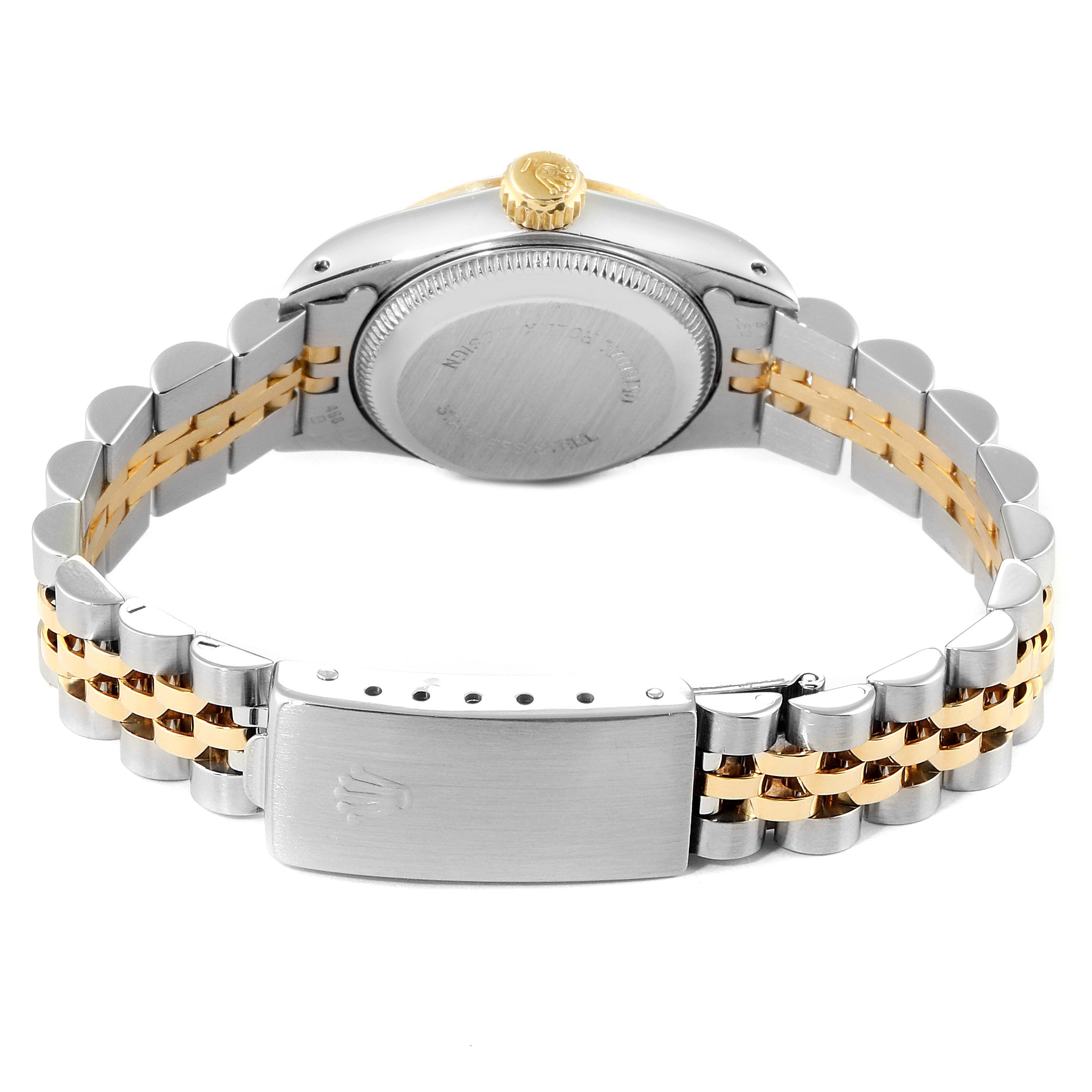 This image shows the back view of the Rolex Oyster Perpetual 67243 Women's Steel and Gold (two tone) White Dial 67243 Women's Steel and Gold (two tone) White Dial watch, highlighting its two-tone bracelet and clasp.