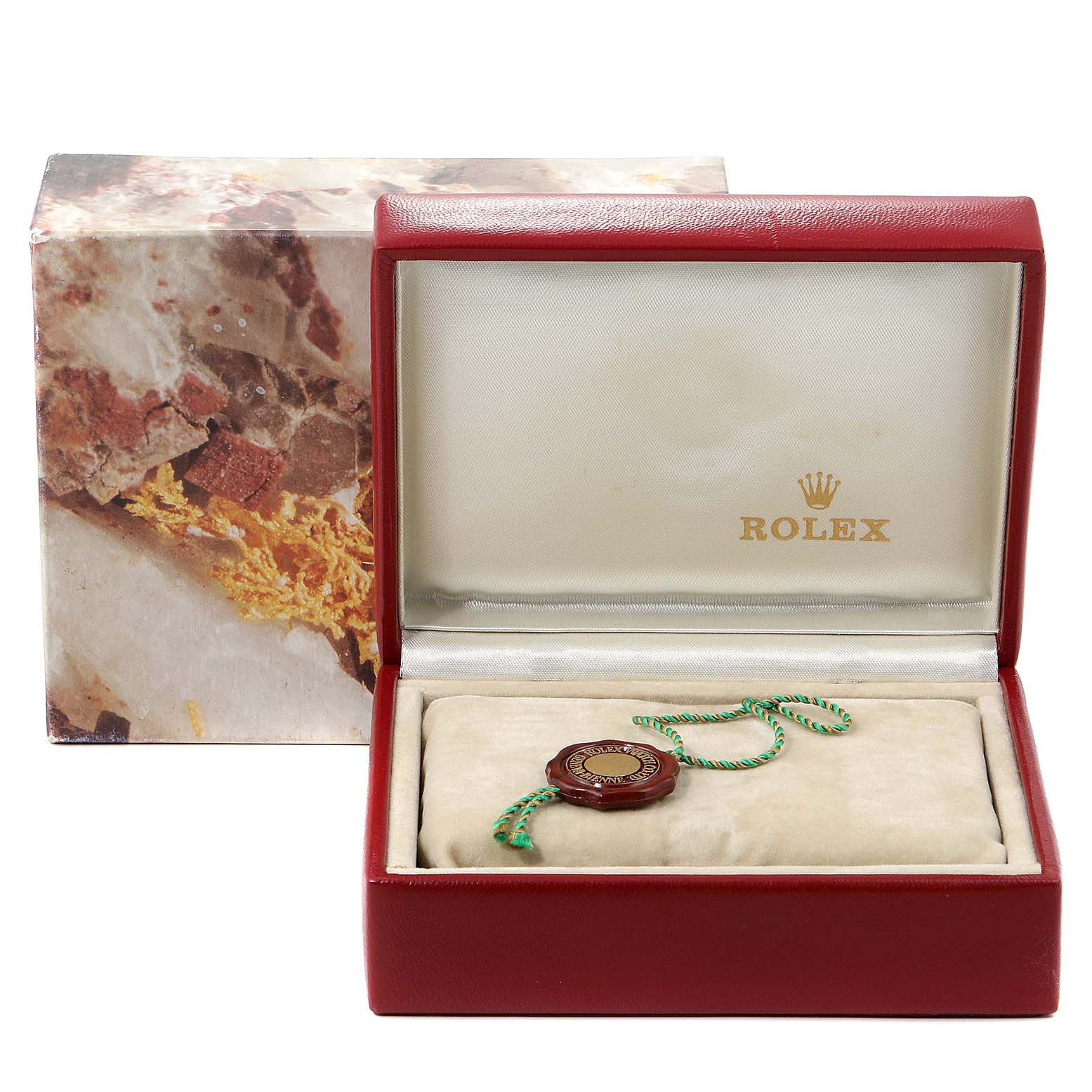 The image shows the packaging box and certificate tag of a Rolex Oyster Perpetual 67243 Women's Steel and Gold (two tone) White Dial 67243 Women's Steel and Gold (two tone) White Dial watch.