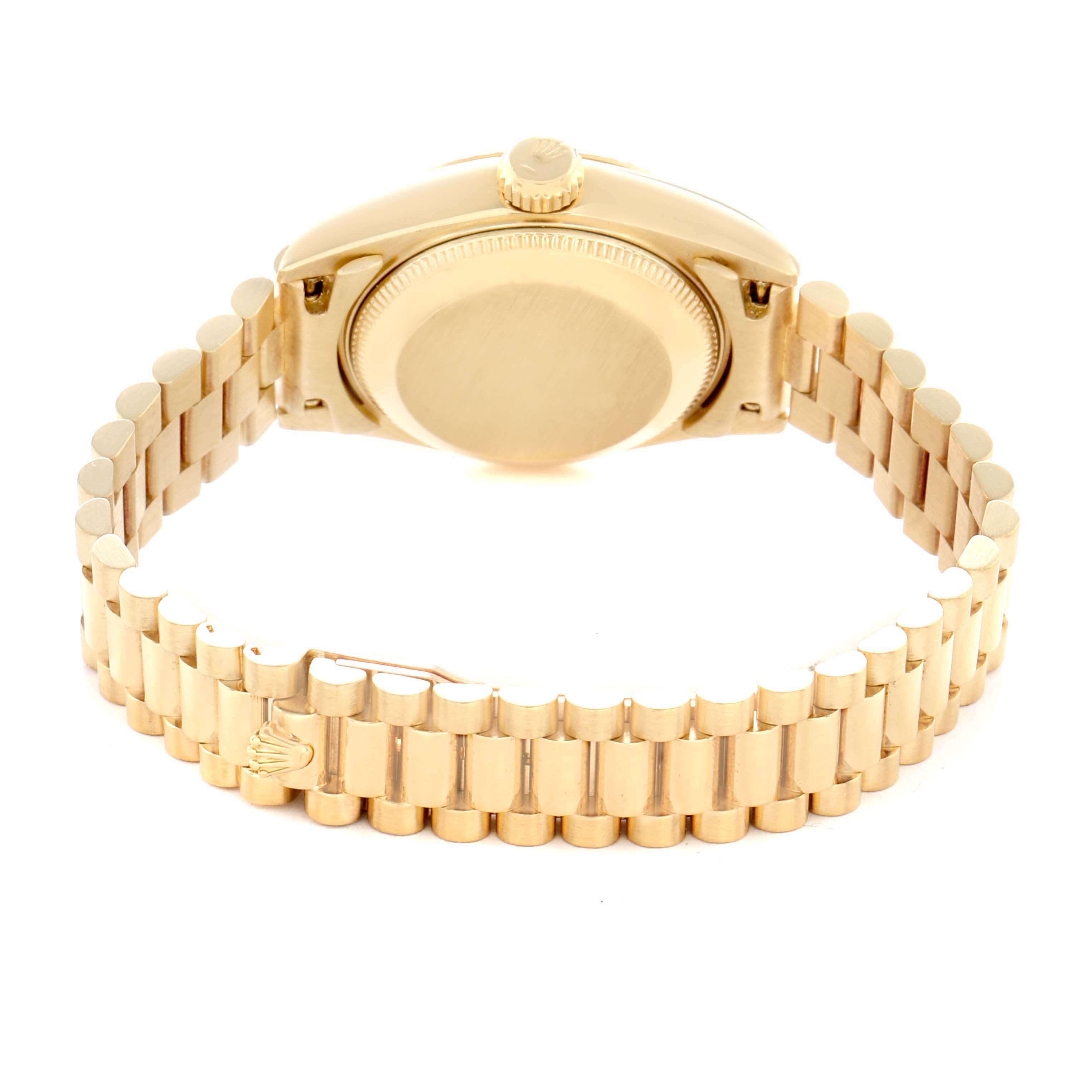The Rolex President 69178 Men
s Yellow Gold Champagne Dial model watch is shown from the back, highlighting the bracelet, case back, and crown.