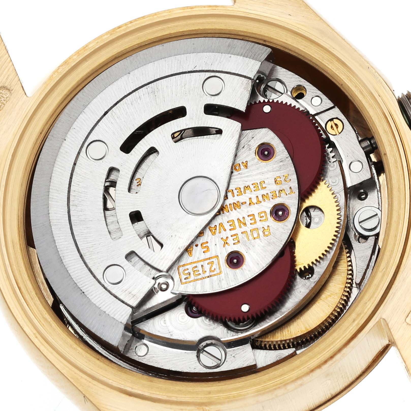 The image shows the inner mechanical movement of a Rolex President 69178 Women's Yellow Gold Champagne Dial 69178 Women's Yellow Gold Champagne Dial model, including gears and the rotor, viewed from the back.