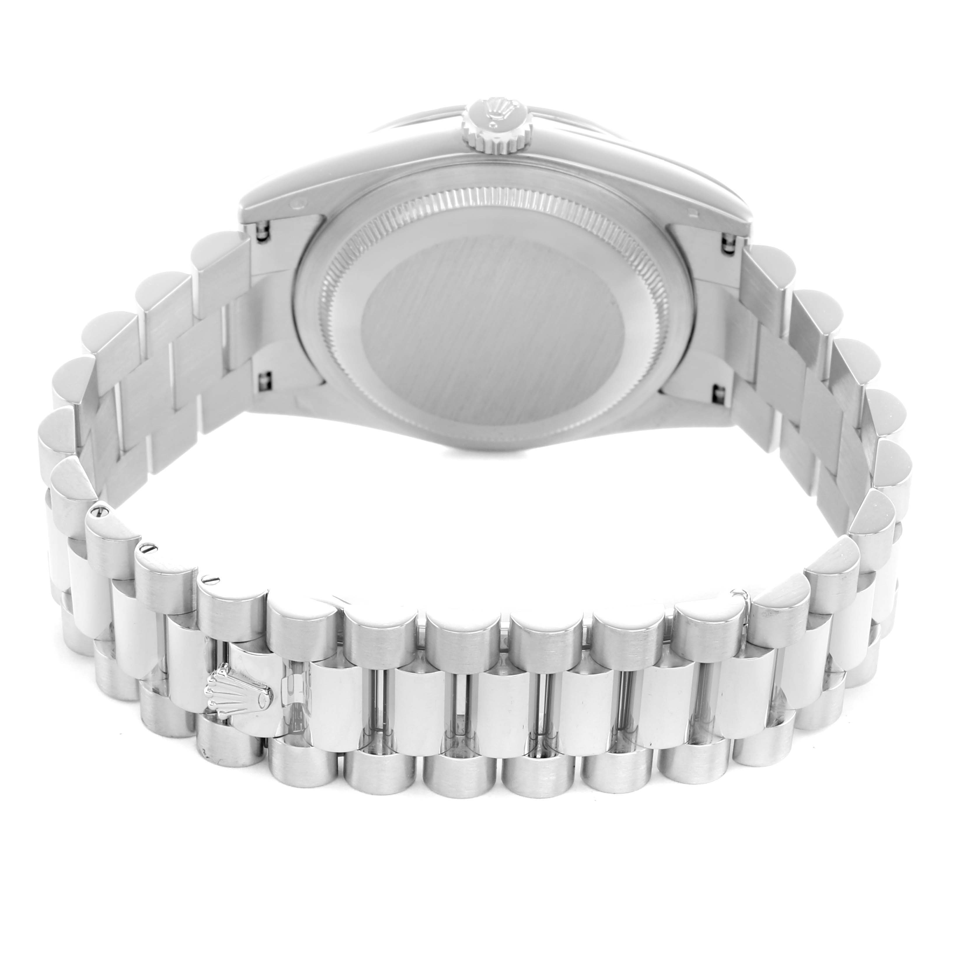 The Rolex President 118346 Men
s Platinum Silver Dial model watch is shown from the back, highlighting its bracelet and closed clasp.