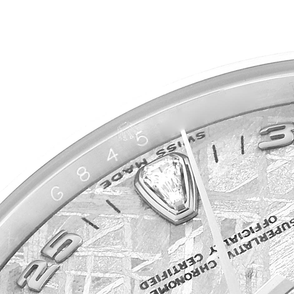 The image shows a close-up of the dial and bezel of the Rolex President 118346 Men
s Platinum Silver Dial watch, highlighting indices and part of the seconds hand.