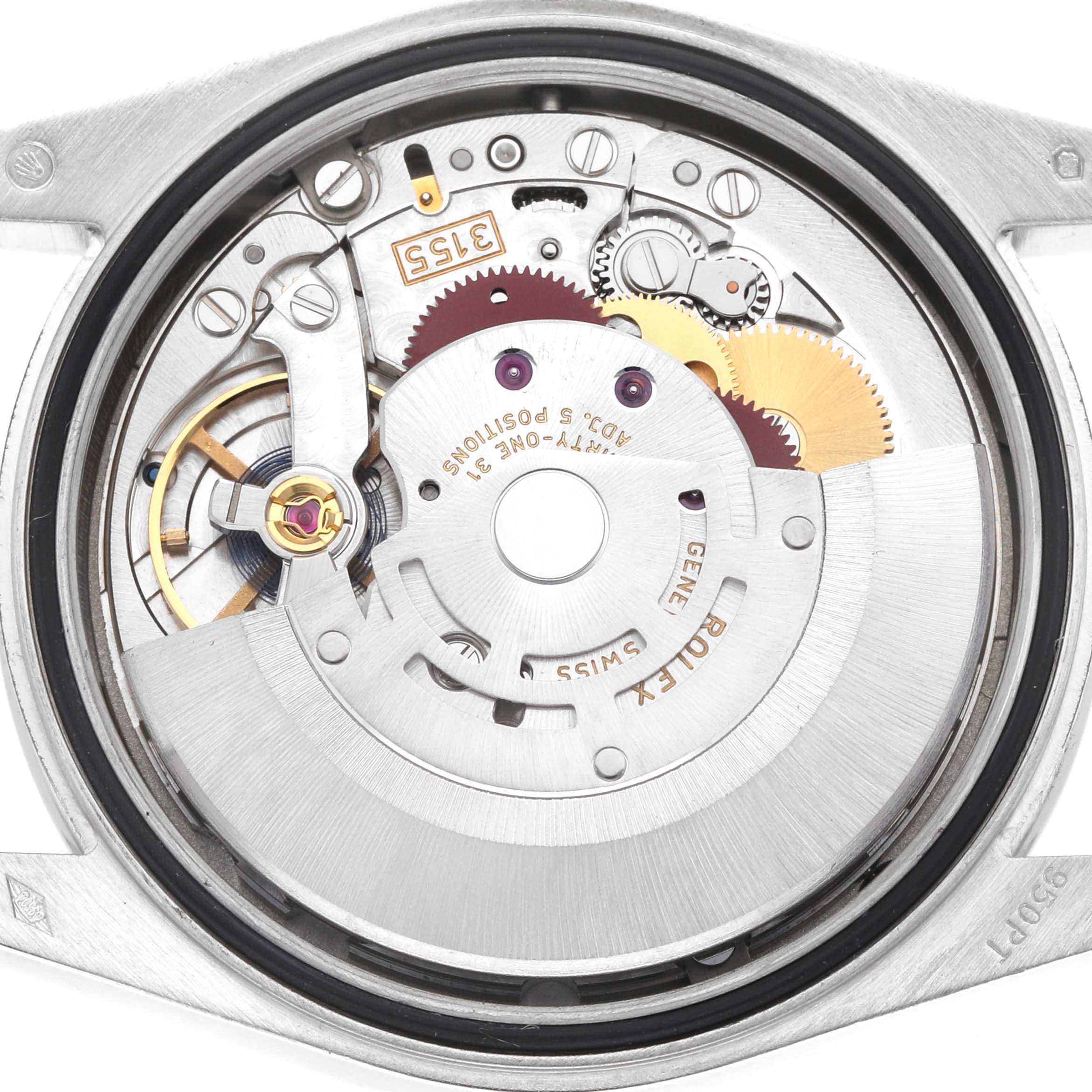 The image shows the internal movement of a Rolex President 118346 Men
s Platinum Silver Dial model from a top-down angle, highlighting gears and mechanical components.