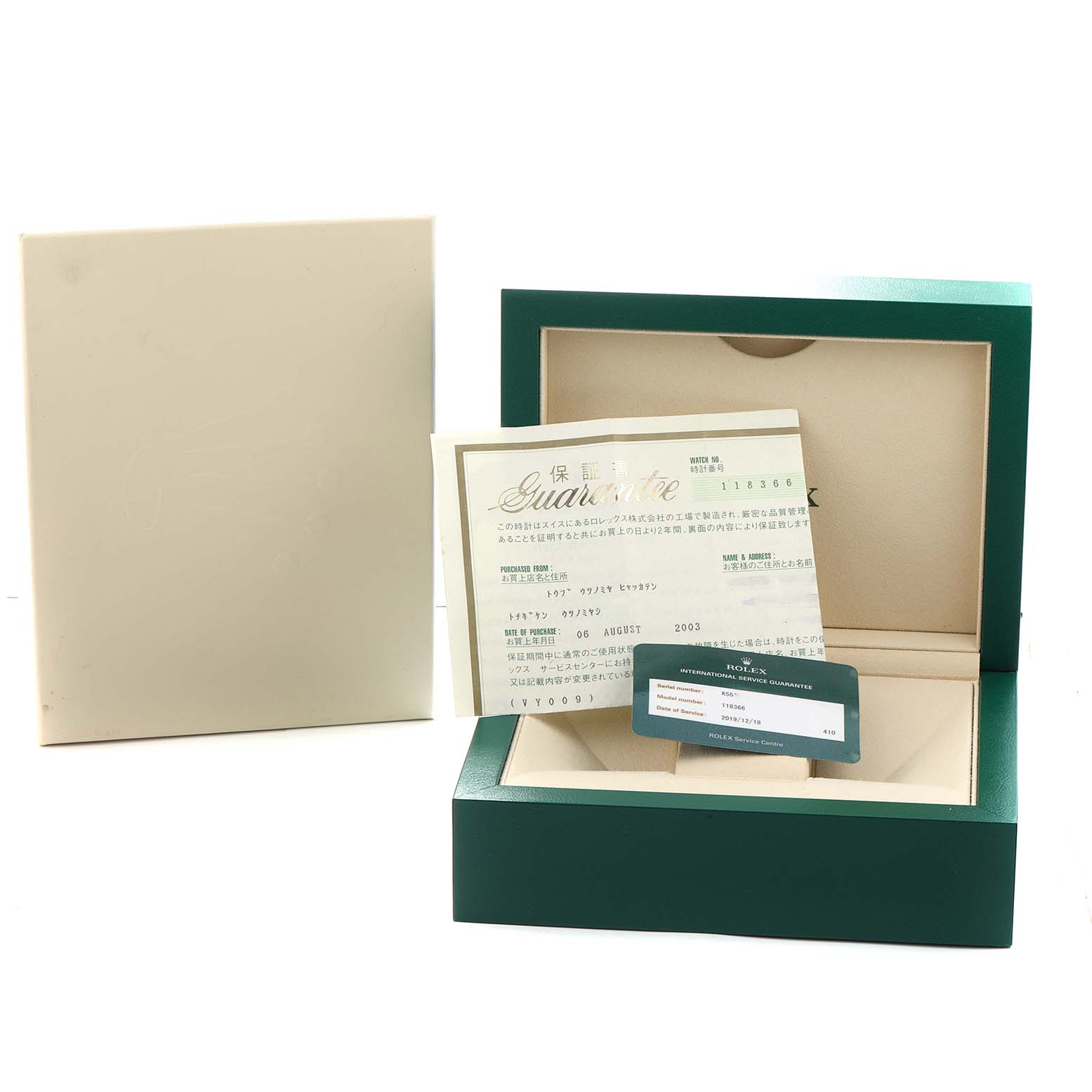 The image shows the packaging and documentation for a Rolex President 118366 Men
s Platinum Blue Dial model, including a green box and guarantee paperwork.