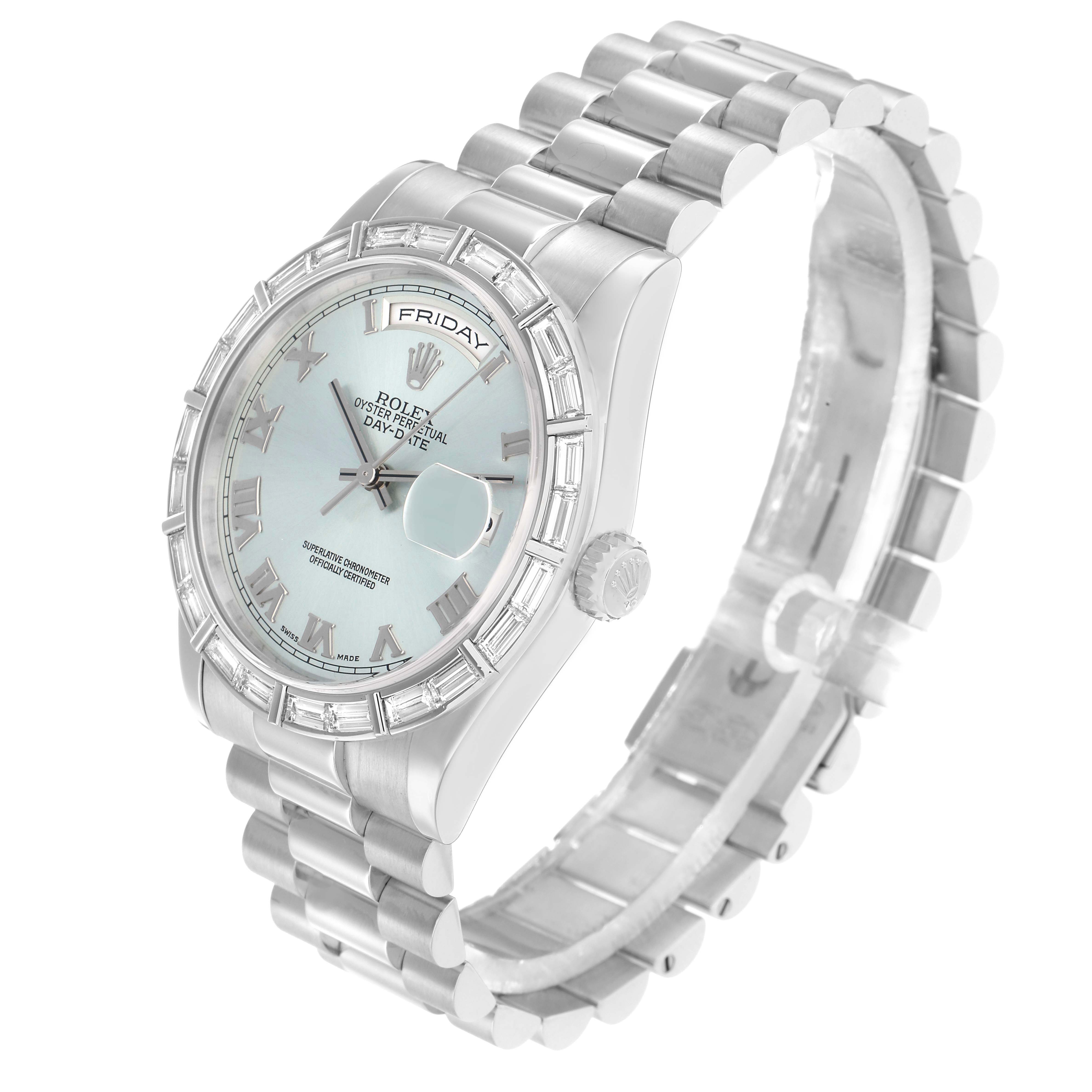 The Rolex President 118366 Men
s Platinum Blue Dial watch is shown at a slight angle, highlighting the face, bezel, bracelet, and crown.