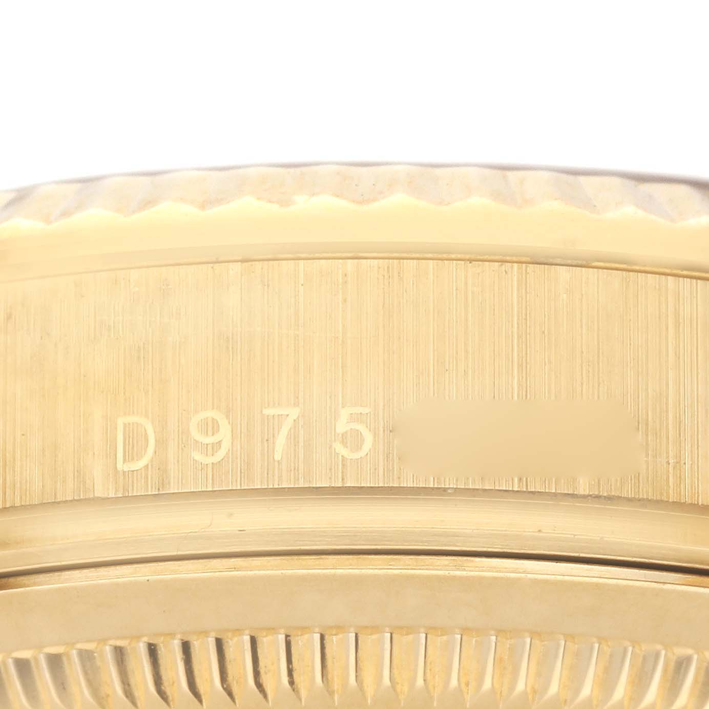 This image shows a close-up of the casing and serial number of a Rolex President 118238 Men
s Yellow Gold Silver Dial 118238 Men
s Yellow Gold Silver Dial model watch.