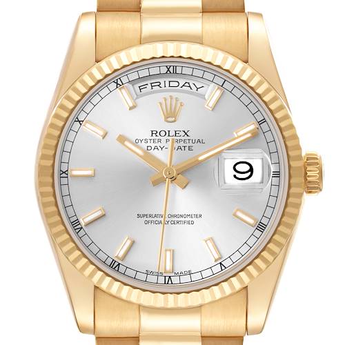 The image shows a frontal view of a Rolex President model watch, highlighting its dial, bezel, crown, and bracelet.