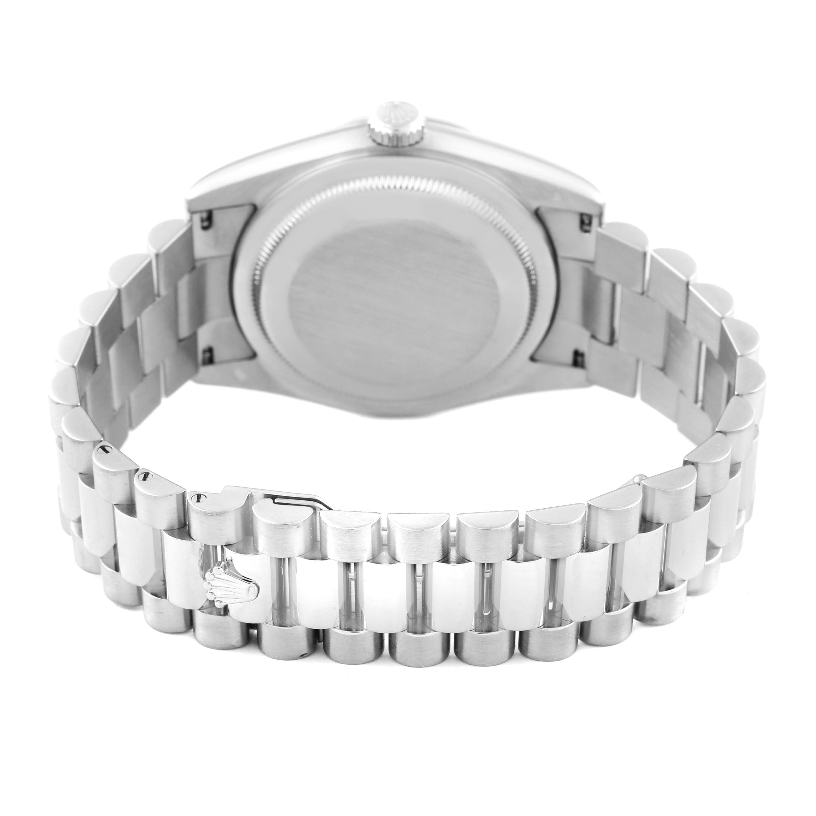 This image shows the backside of a Rolex President 118239 Men's White Gold Silver Dial 118239 Men's White Gold Silver Dial model watch, focusing on the case back and the bracelet links.
