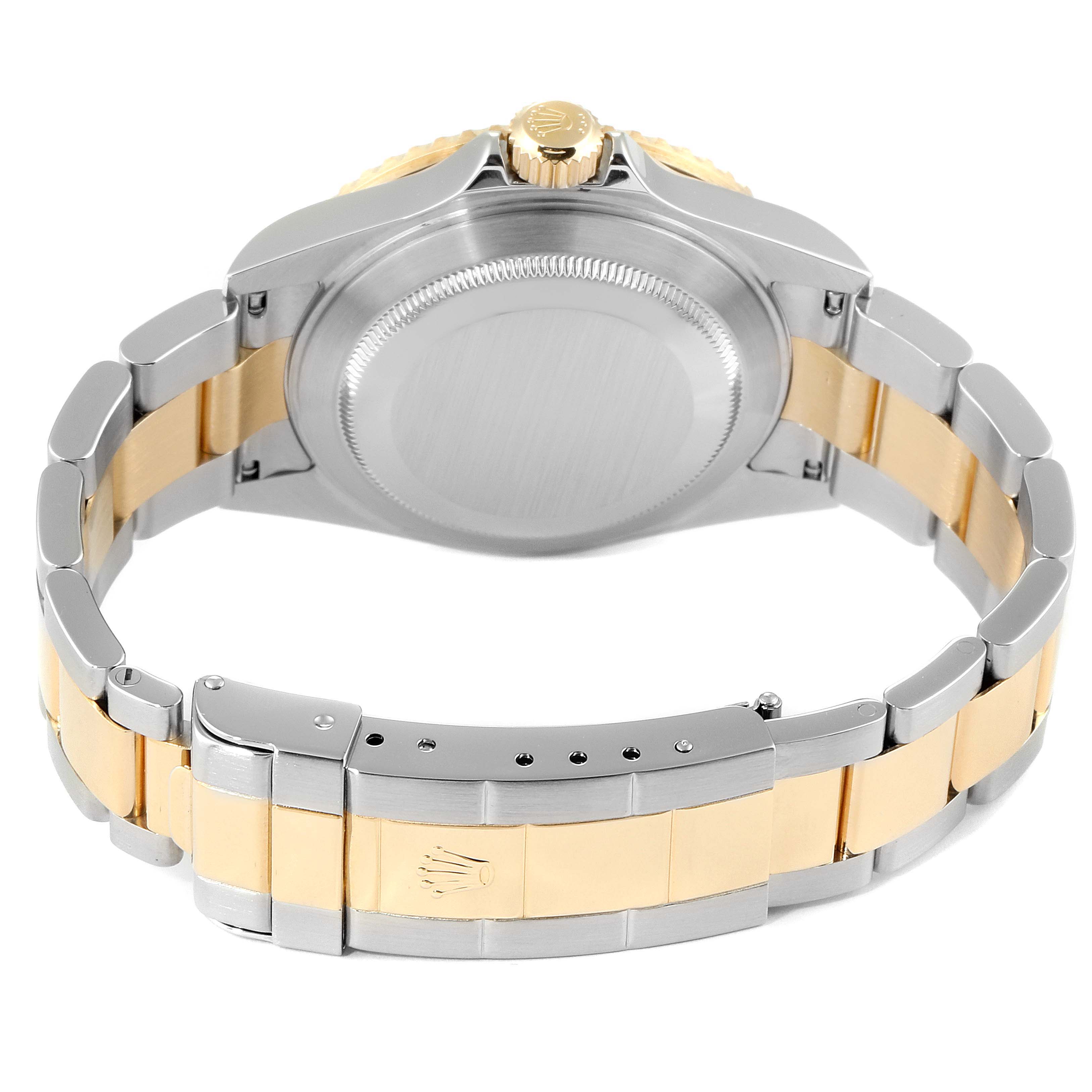 The image shows the back view of a Rolex Submariner 16613 Men
s Steel and Gold (two tone) Grey Dial 16613 Men
s Steel and Gold (two tone) Grey Dial watch, highlighting the case back and two-tone bracelet.