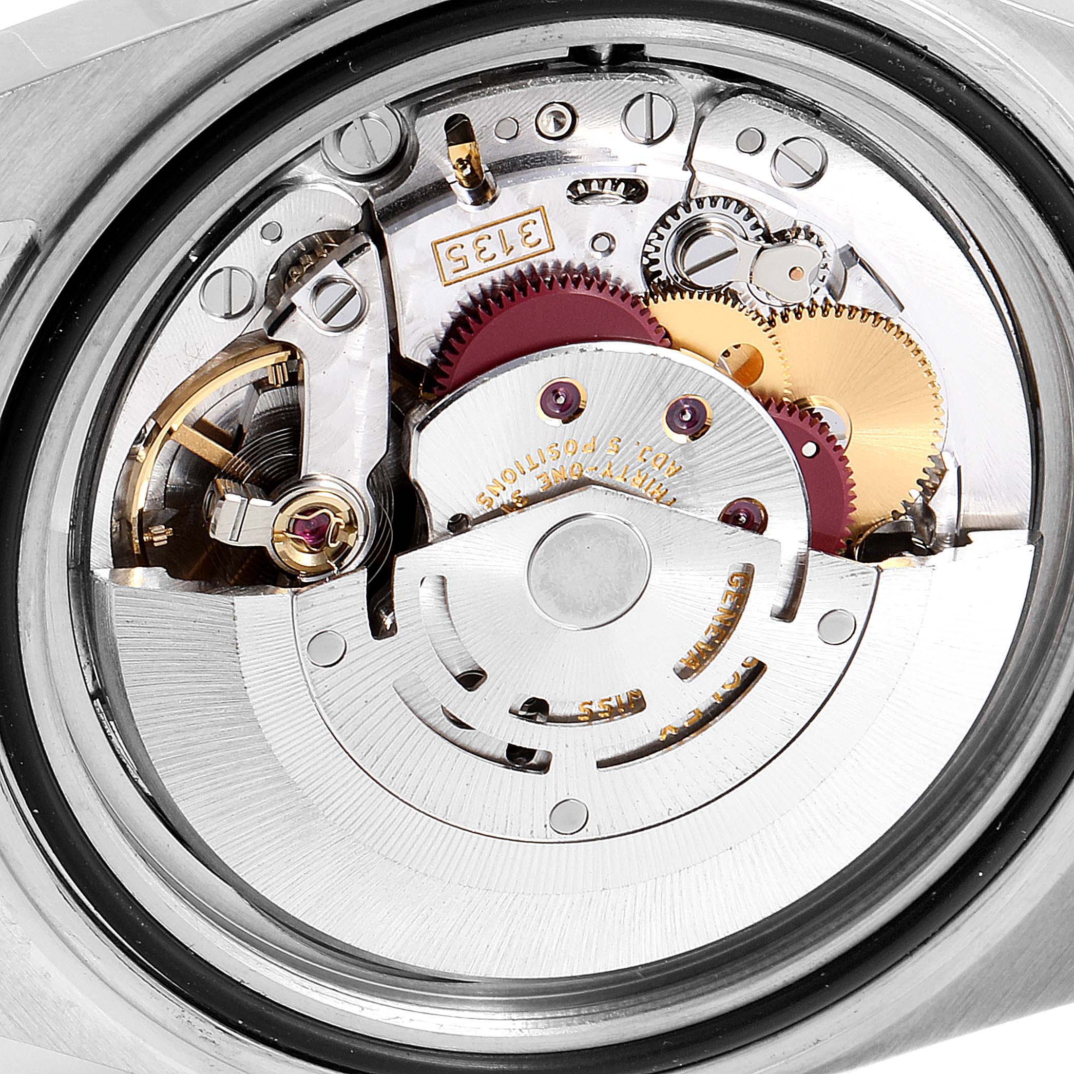 This image shows the detailed internal mechanism of a Rolex Submariner 16613 Men
s Steel and Gold (two tone) Grey Dial 16613 Men
s Steel and Gold (two tone) Grey Dial watch from a rear angle.