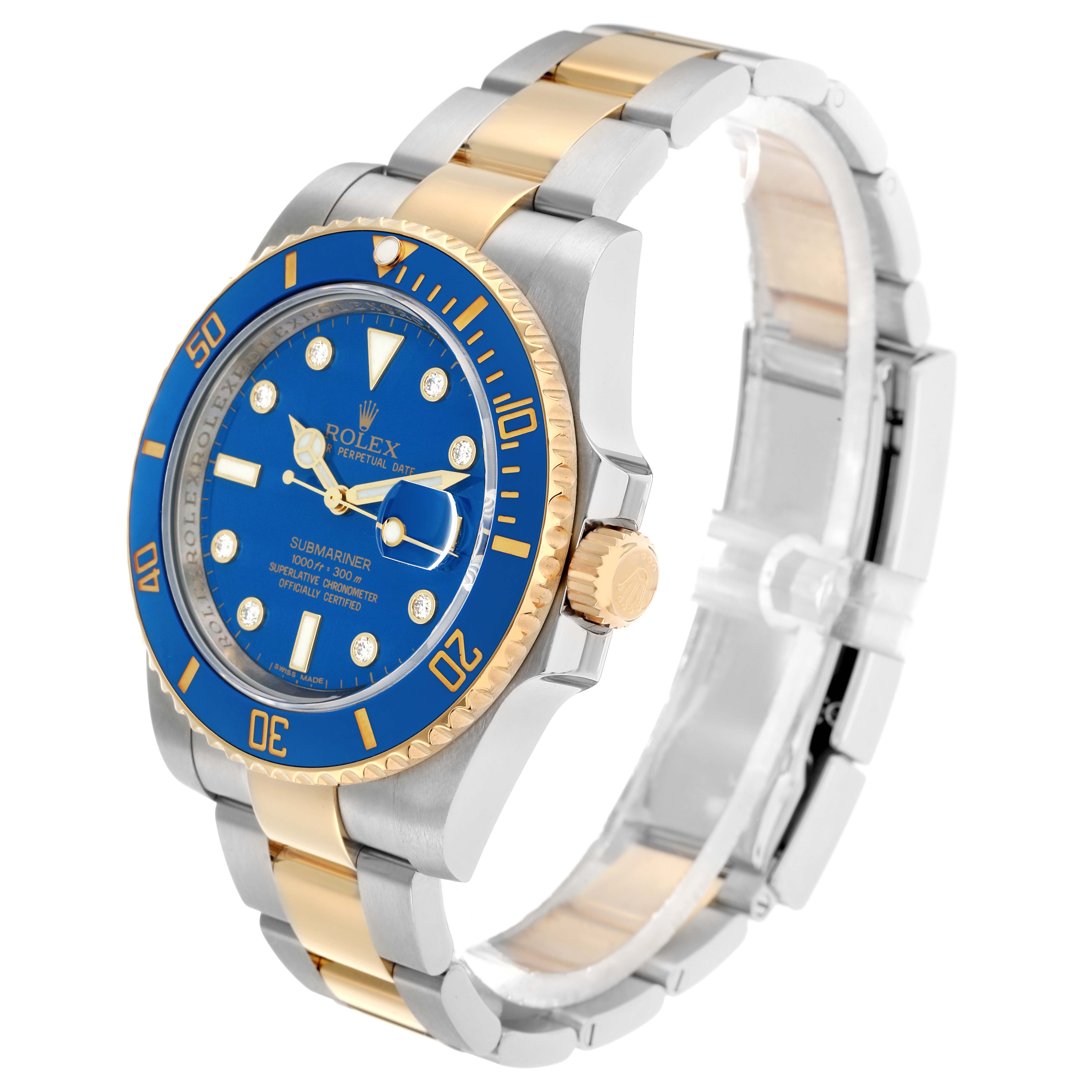 The image shows a Rolex Submariner 116613 Men
s Steel and Gold (two tone) Blue Dial watch at a three-quarter angle, highlighting the blue bezel, dial, and two-tone bracelet.