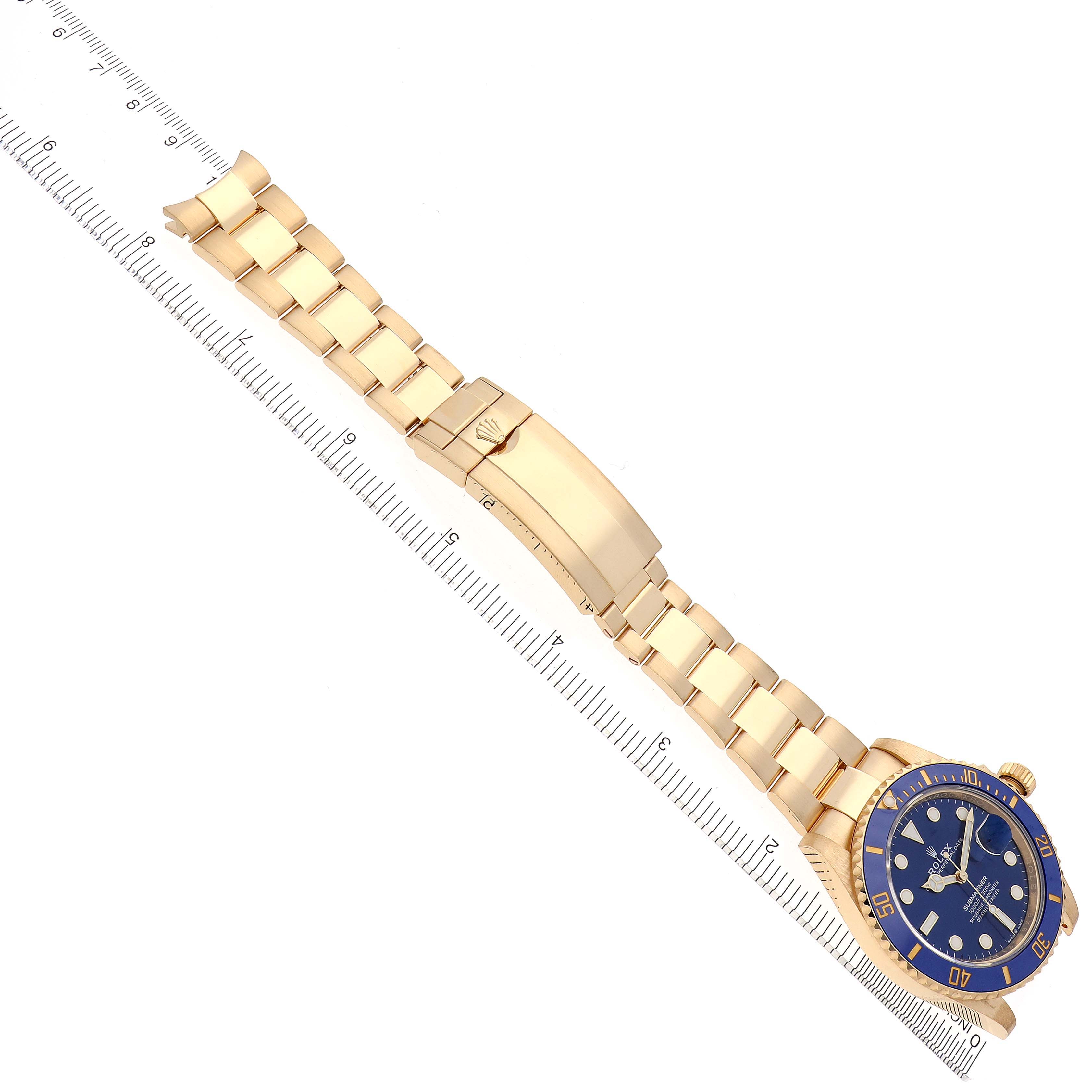 The Rolex Submariner 126618LB Men's Yellow Gold Blue Dial 126618LB Men's Yellow Gold Blue Dial watch is shown at an angled top view, displaying the bracelet, clasp, and part of the dial and bezel.