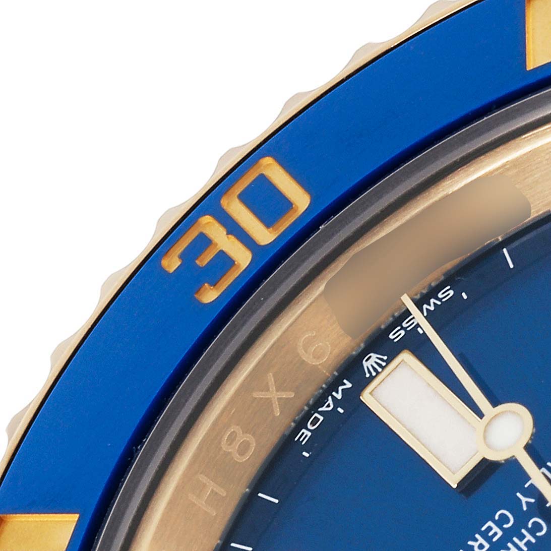 The image shows a close-up of the bezel and dial of a Rolex Submariner 126618LB Men's Yellow Gold Blue Dial 126618LB Men's Yellow Gold Blue Dial with a focus on the blue and gold features.