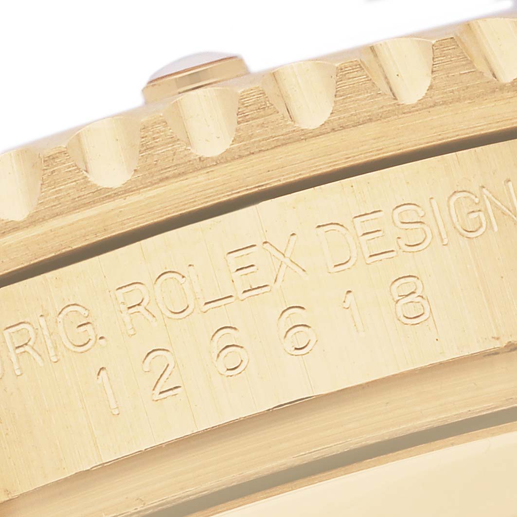 The image shows a close-up of the side of the Rolex Submariner 126618LB Men's Yellow Gold Blue Dial 126618LB Men's Yellow Gold Blue Dial, highlighting the model number and engraved text.