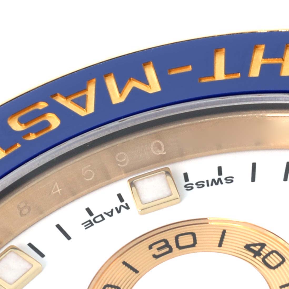 The image shows a close-up of the dial, bezel, and part of the face of a Rolex Yacht-Master 116688 Men's Yellow Gold White Dial 116688 Men's Yellow Gold White Dial watch.