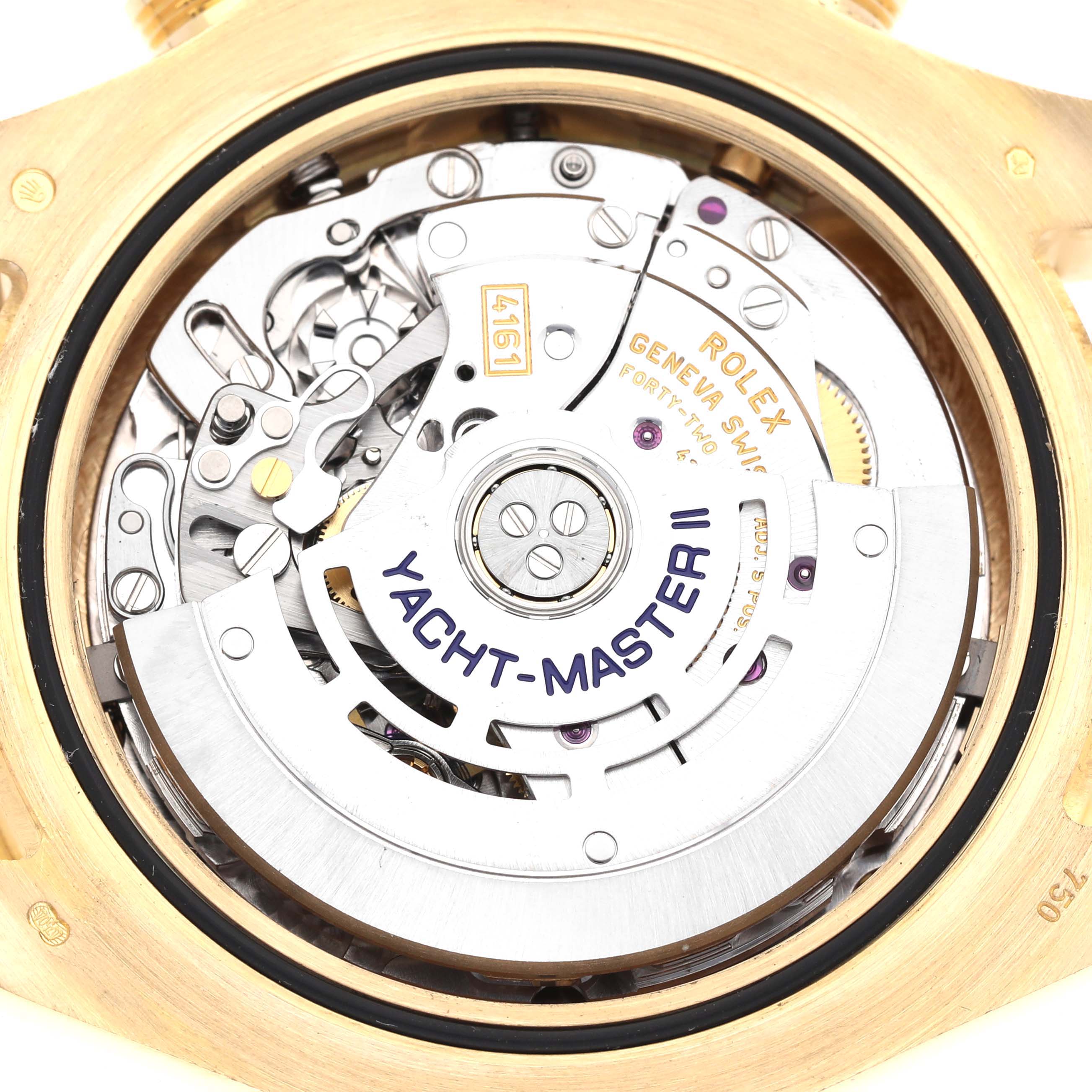 The image shows the internal movement of the Rolex Yacht-Master 116688 Men's Yellow Gold White Dial 116688 Men's Yellow Gold White Dial II from a back view, highlighting intricate components.