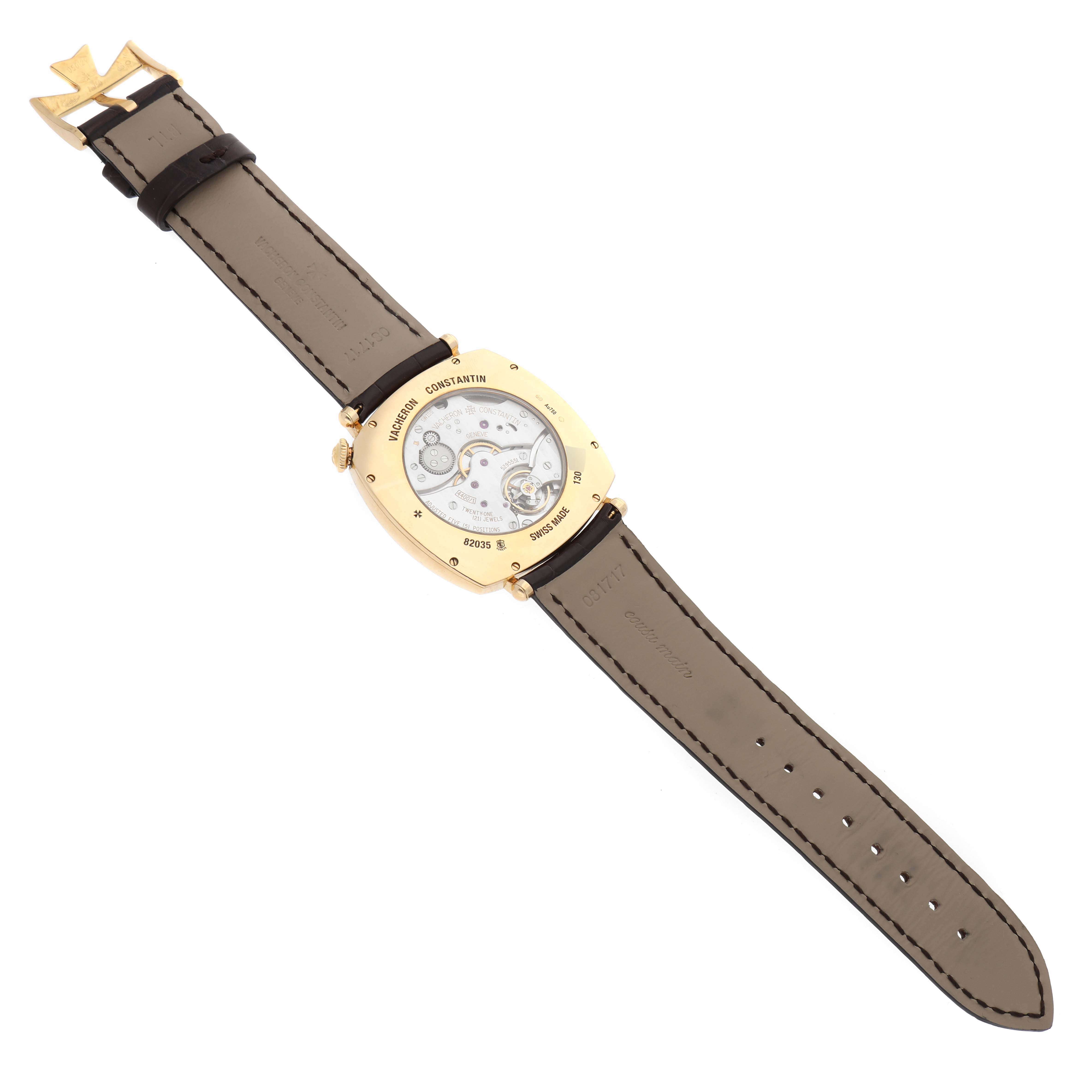 This image shows the back view of a Vacheron Constantin Historiques 82035-000J-9964 Men's Yellow Gold Silver Dial 82035-000J-9964 Men's Yellow Gold Silver Dial model watch, highlighting its transparent case back and strap.