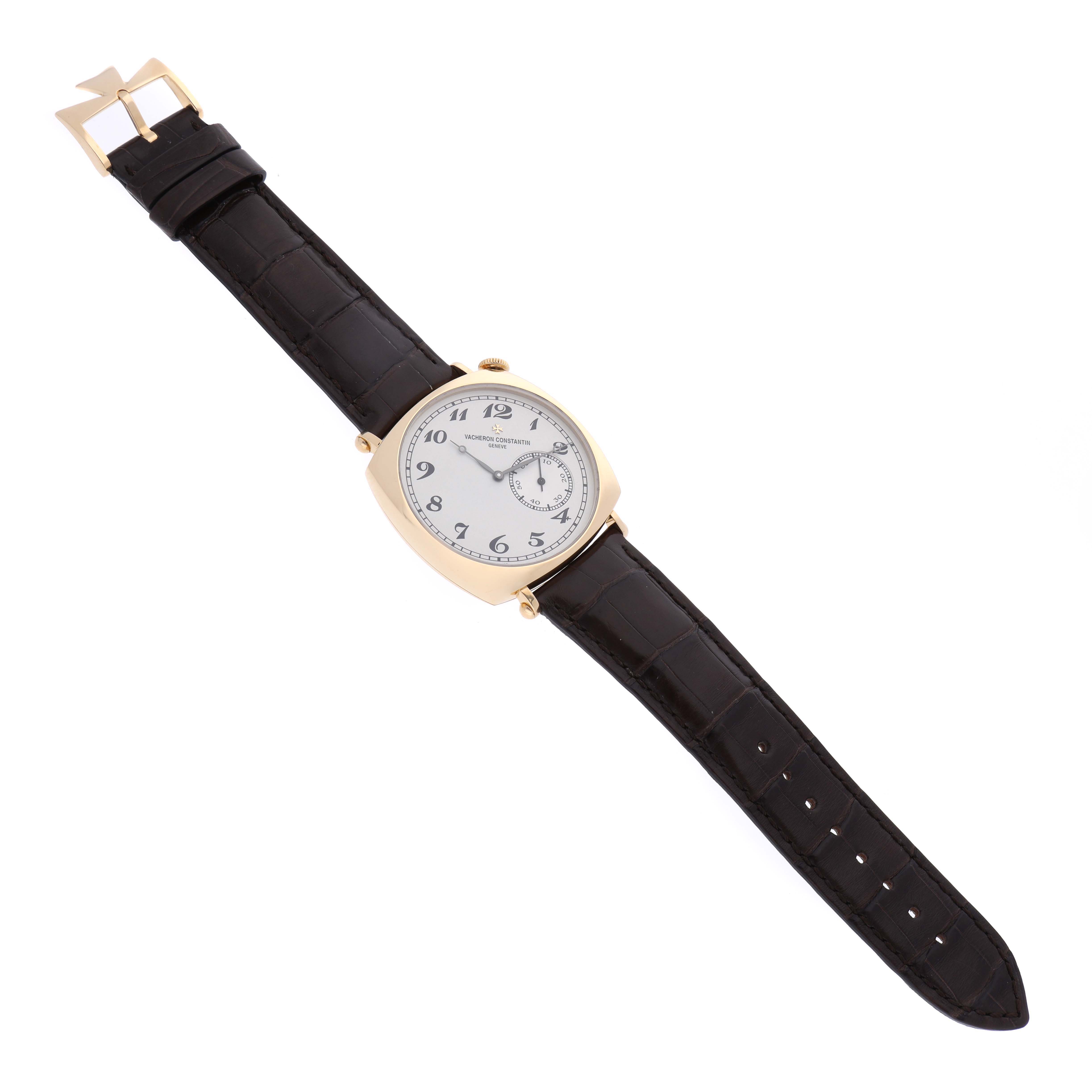 The Vacheron Constantin Historiques 82035-000J-9964 Men's Yellow Gold Silver Dial 82035-000J-9964 Men's Yellow Gold Silver Dial model watch is shown flat with a top-down angle, displaying the entire strap and face.