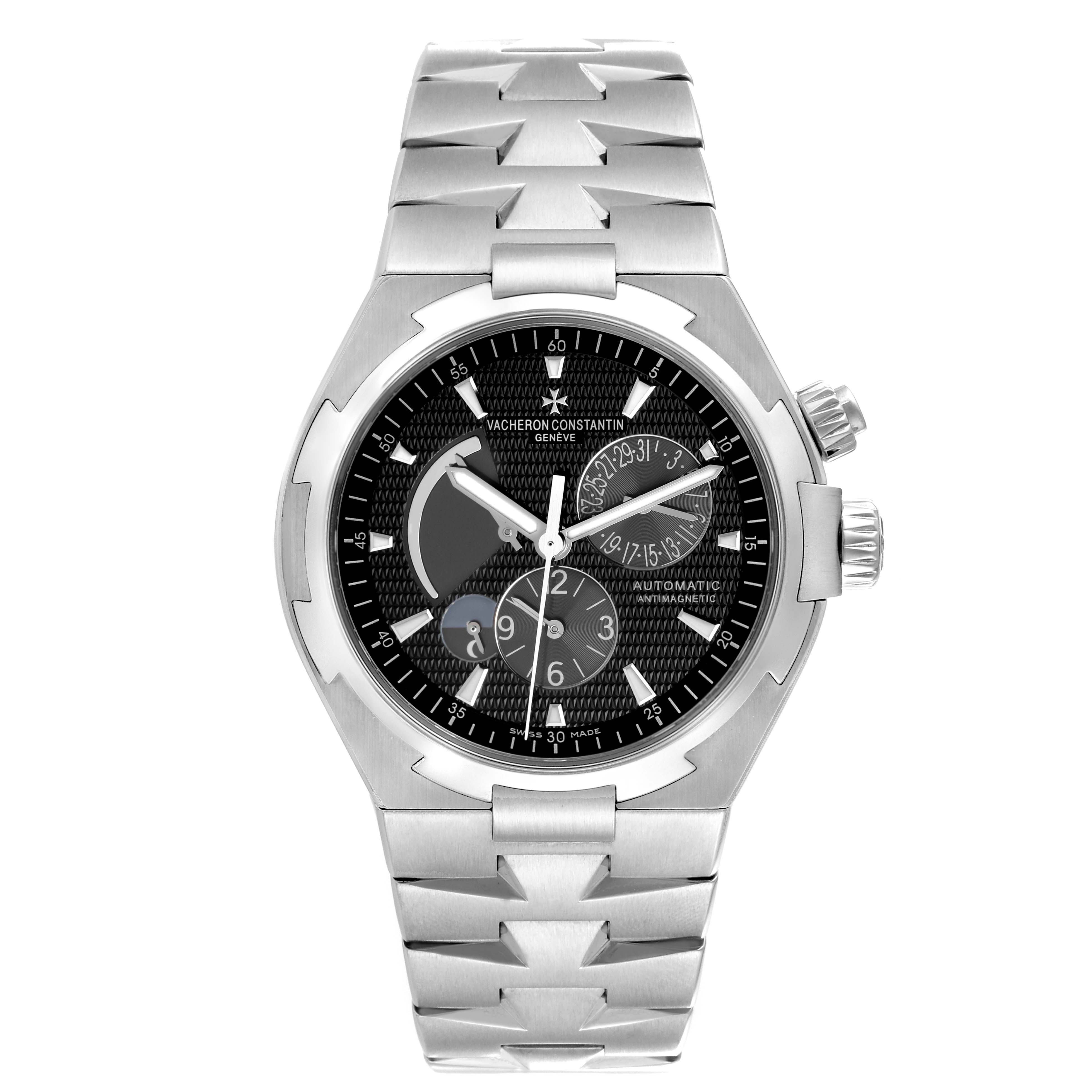The Vacheron Constantin Overseas 47450/B01A-9227 Men's Stainless Steel Black Dial 47450/B01A-9227 Men's Stainless Steel Black Dial watch is shown from the front, displaying its dial, bracelet, and pushers.