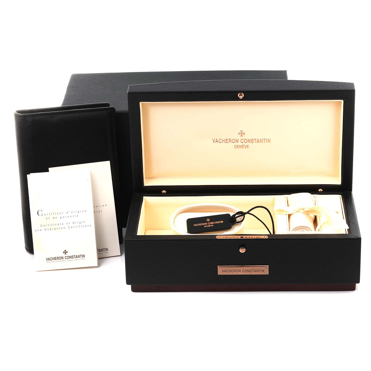 The image shows an open box for a Vacheron Constantin Overseas 47450/B01A-9227 Men's Stainless Steel Black Dial 47450/B01A-9227 Men's Stainless Steel Black Dial model watch, along with booklets and a tag.