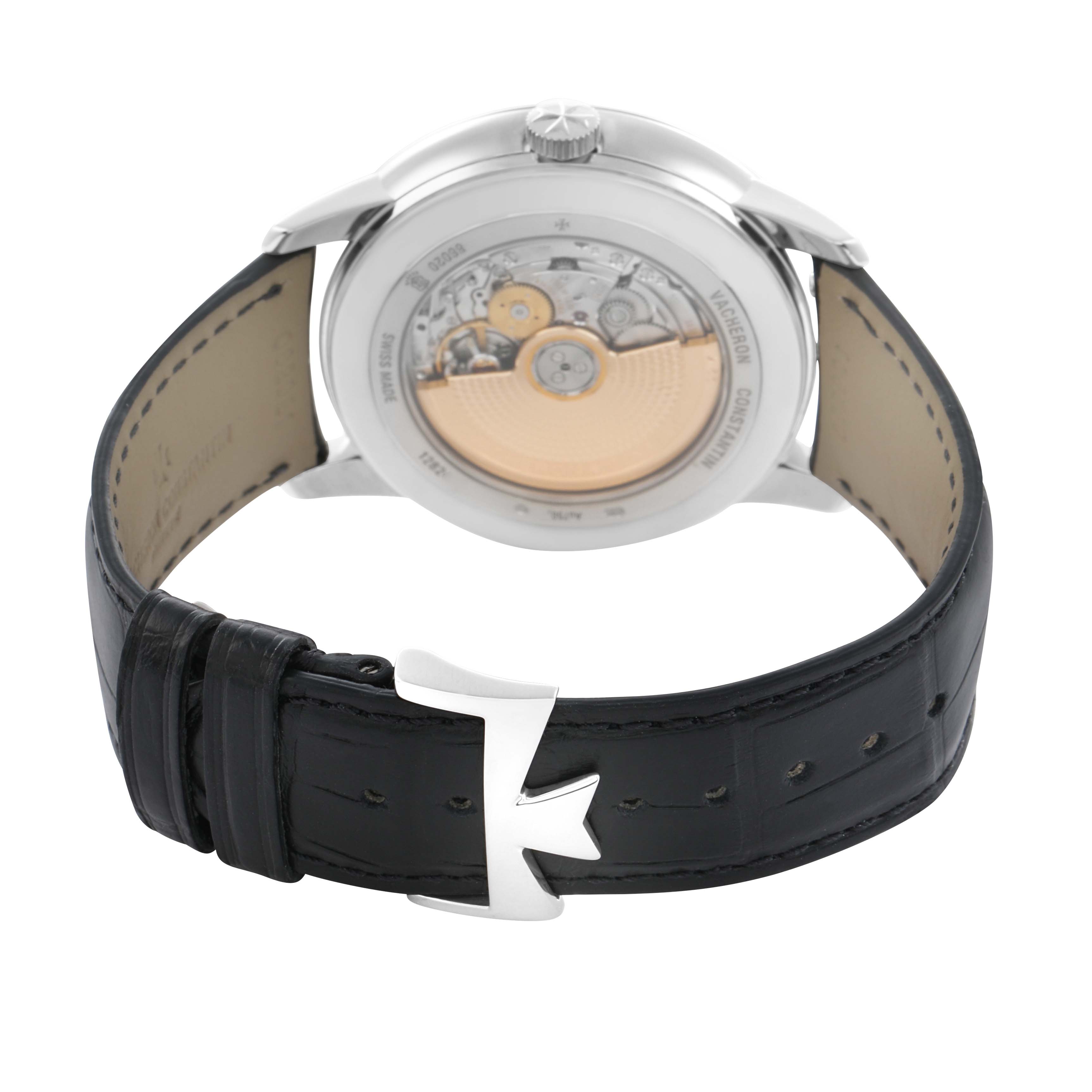 The image shows the back view of a Vacheron Constantin Patrimony 86020 Men
s White Gold Silver Dial watch, highlighting its movement and leather strap with a distinctive buckle.