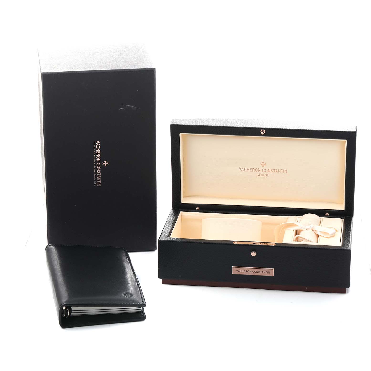 The image shows the storage and presentation box for the Patrimony model by Vacheron Constantin, along with a black booklet.