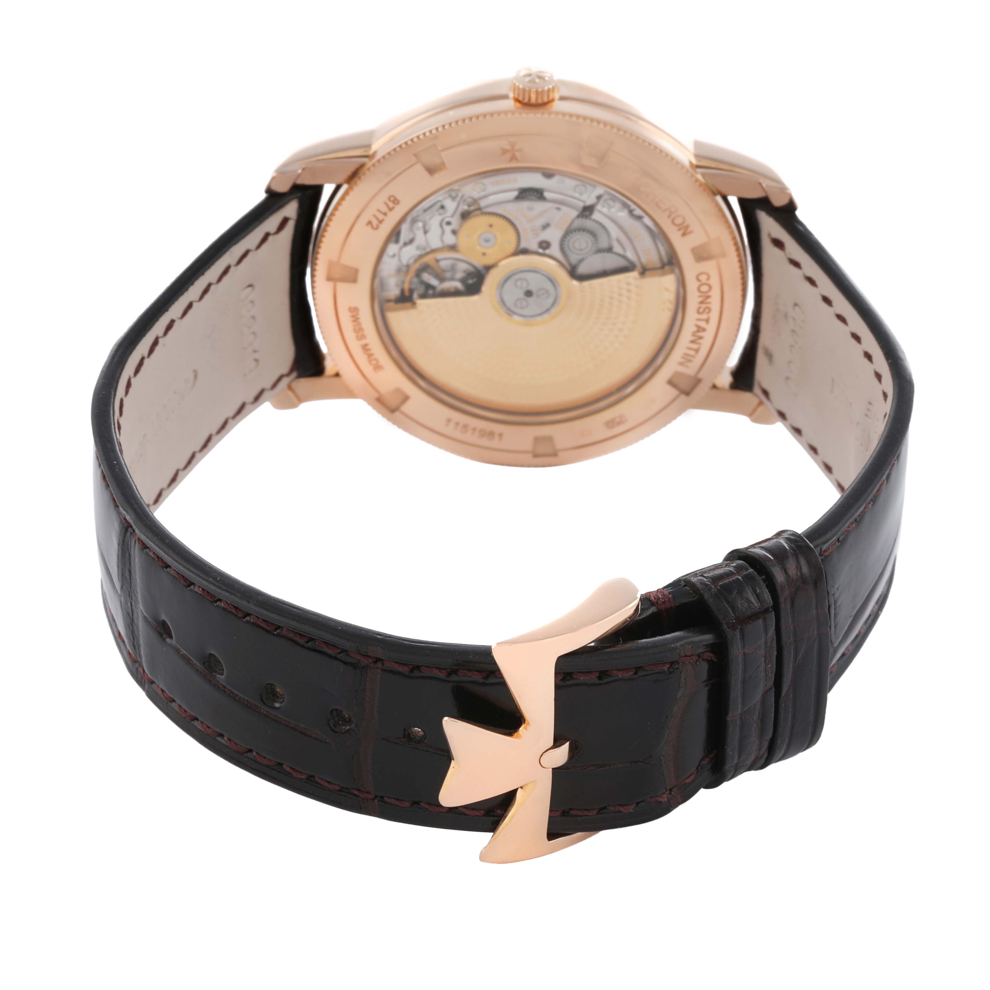 The Vacheron Constantin Traditionnelle 87172/000R-9302 Men
s Rose Gold Silver Dial watch is shown from the back, highlighting the movement and clasp on the leather strap.