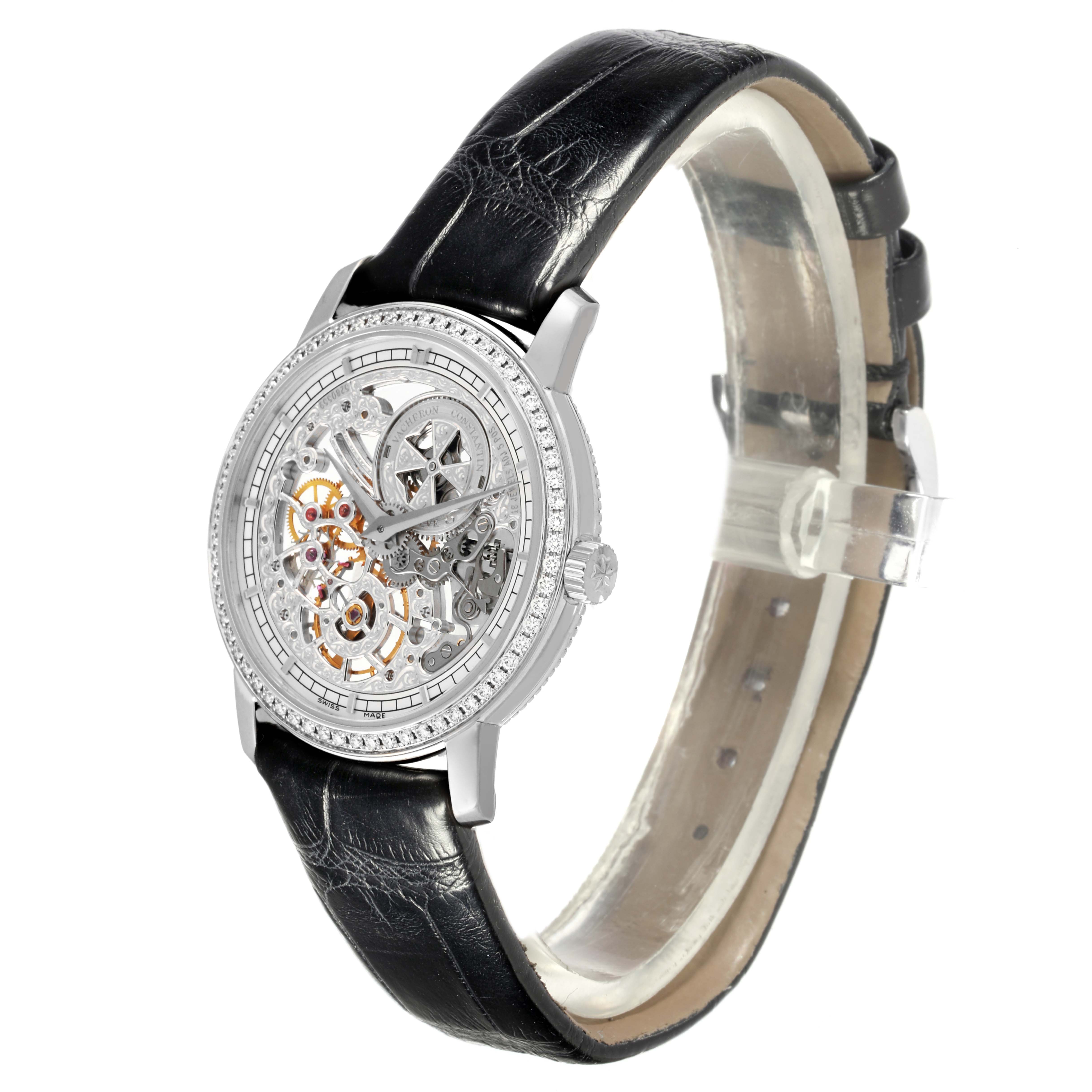 The Vacheron Constantin Traditionnelle 33558/000G-9394 Women
s White Gold Silver Dial 33558/000G-9394 Women
s White Gold Silver Dial watch is shown at a side angle, displaying its skeleton dial, bezel, case, and black leather strap.