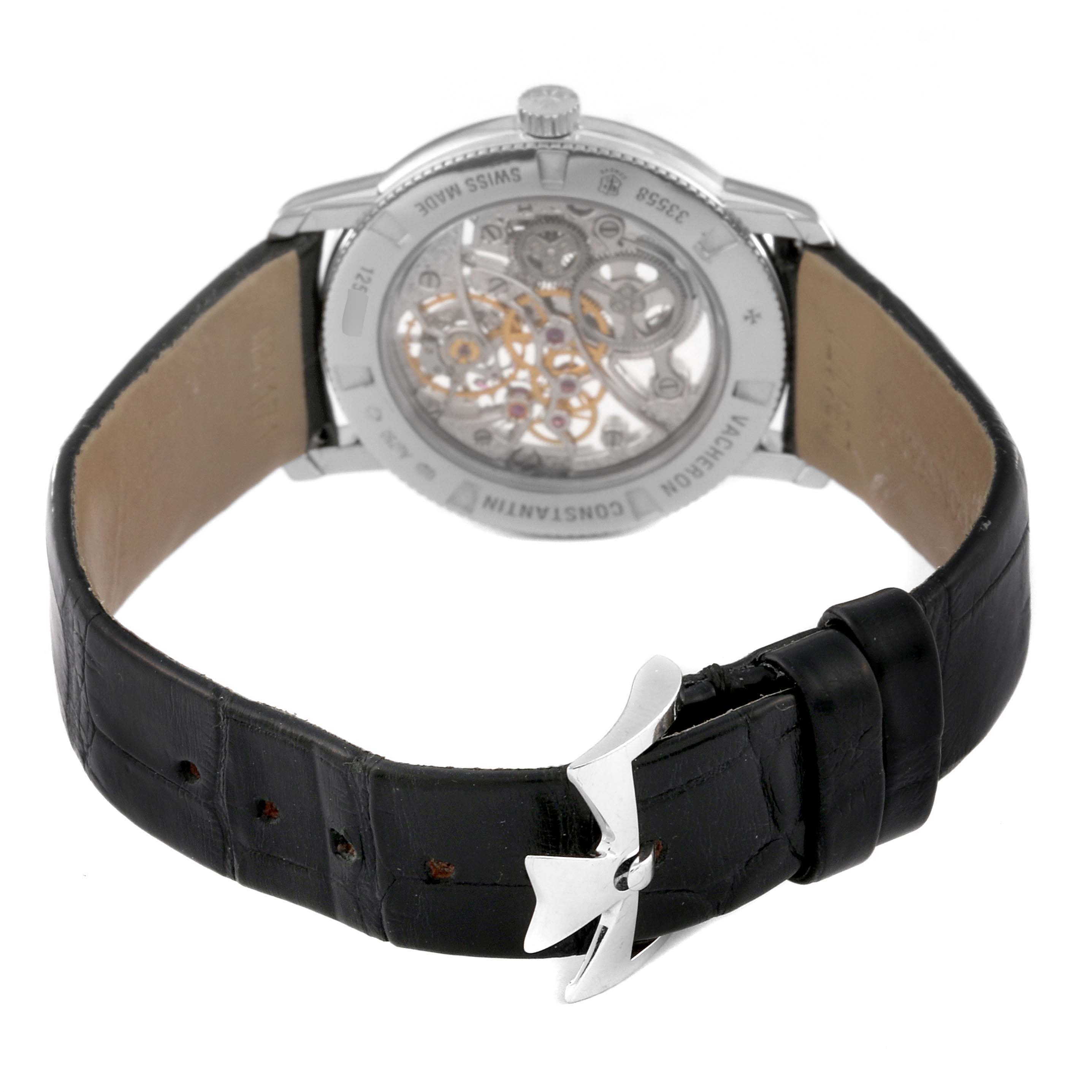 The image shows the back view of a Vacheron Constantin Traditionnelle 33558/000G-9394 Women
s White Gold Silver Dial 33558/000G-9394 Women
s White Gold Silver Dial watch, highlighting its transparent case back and leather strap.