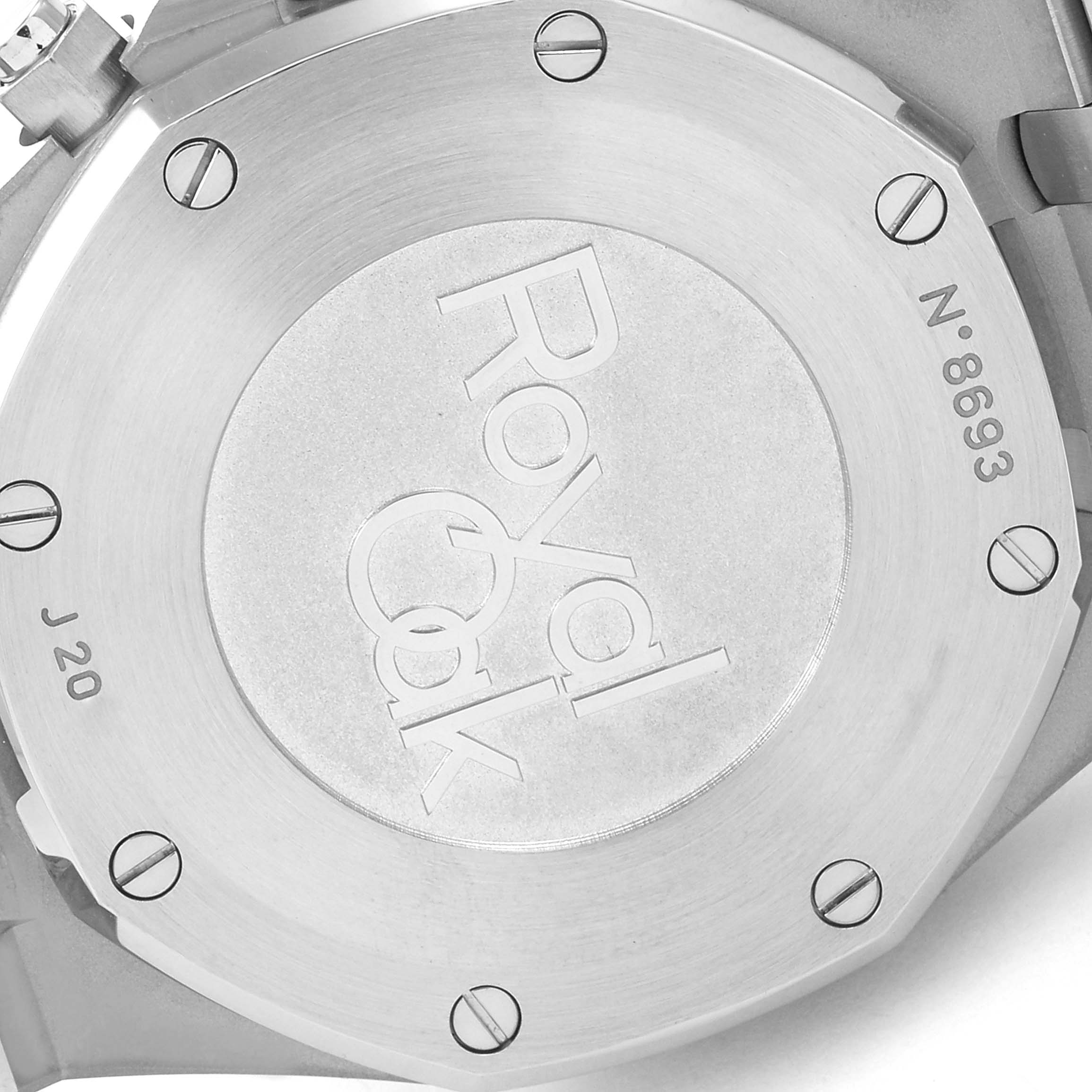The image shows the engraved case back of a Royal Oak watch by Audemars Piguet, viewed from behind.