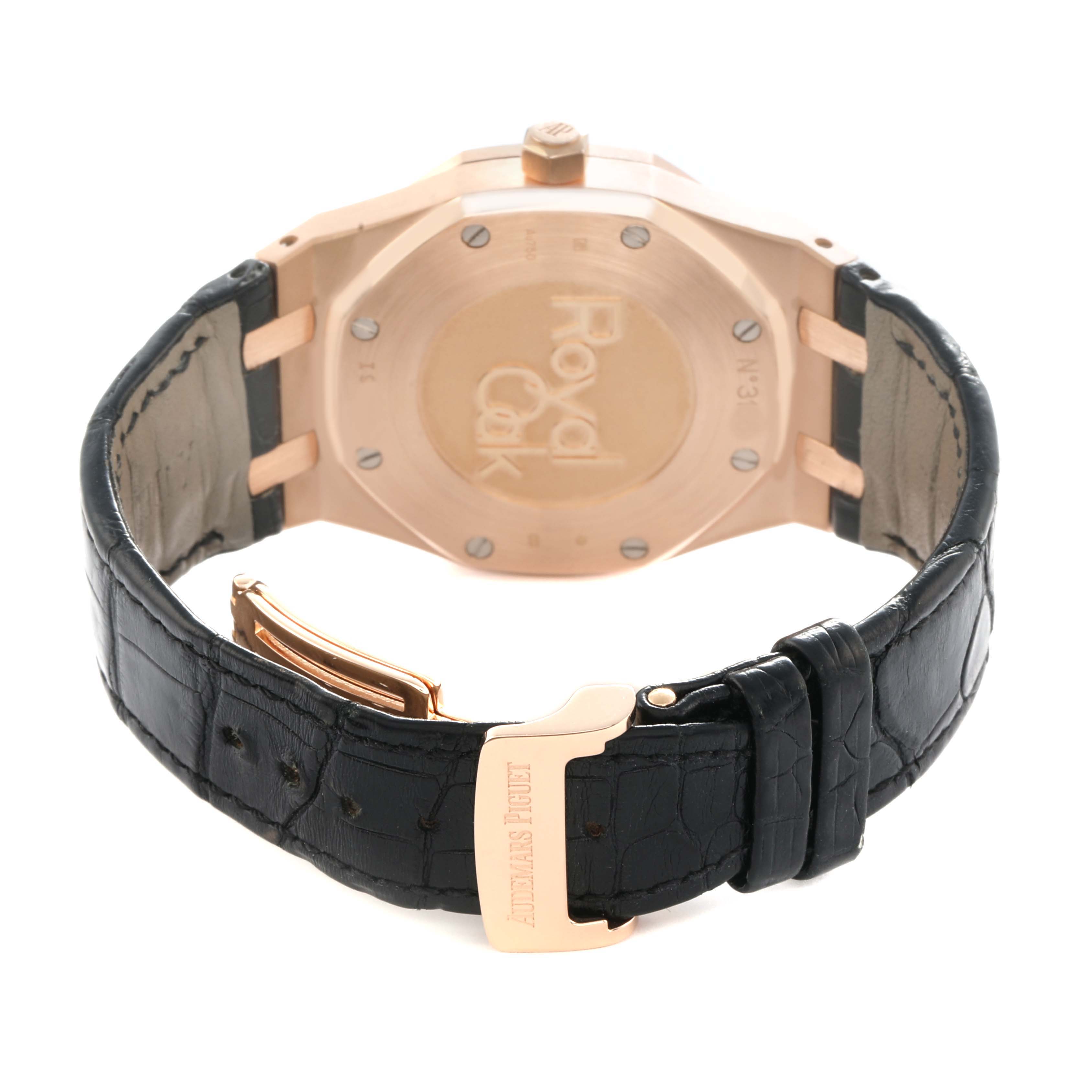The image shows the back of the Audemars Piguet Royal Oak 26120OR Men
s Rose Gold Black Dial watch, featuring its casing and clasp.