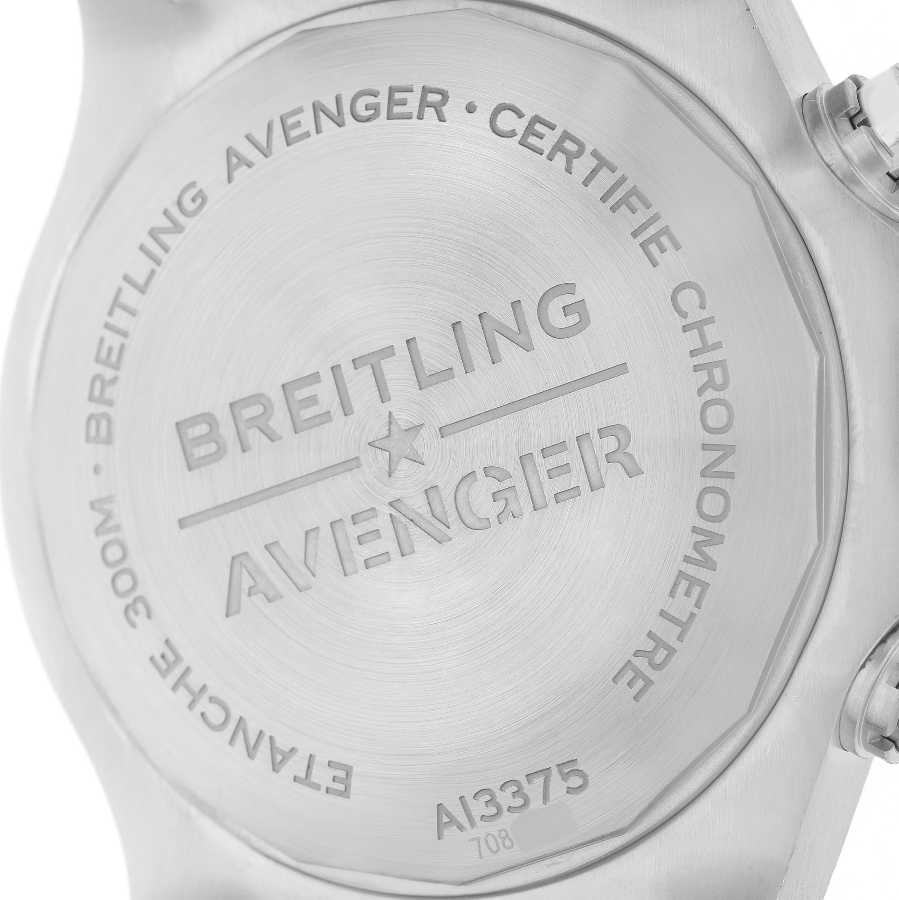 The image shows the back case of a Breitling Avenger A13375 Men's Stainless Steel Black Dial watch with engraved details and model information.