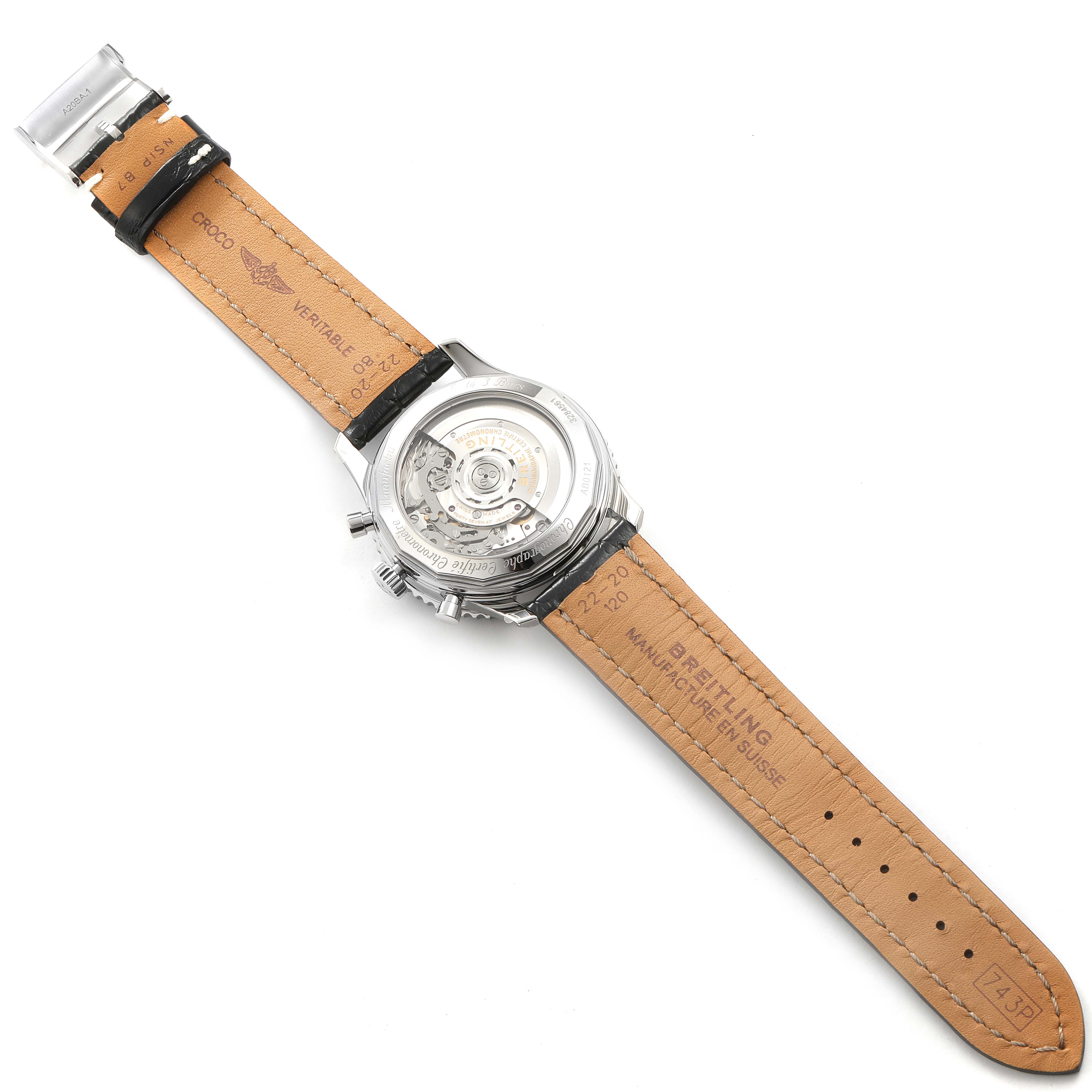 The image shows the back view of a Breitling Navitimer AB0121C4-C920-731P Men's Stainless Steel Blue Dial AB0121C4-C920-731P Men's Stainless Steel Blue Dial watch with its open case back and leather strap visible.