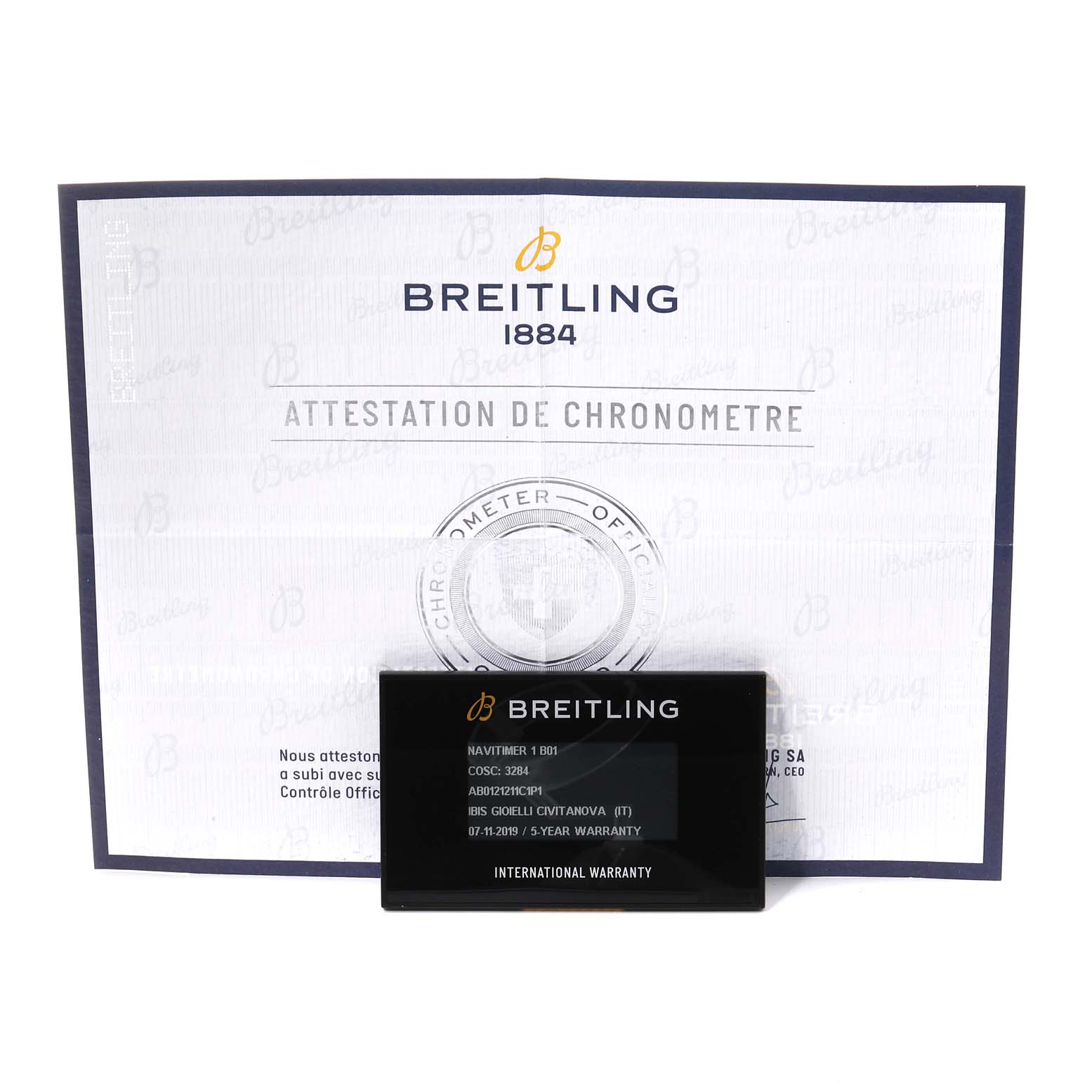 The image shows the Breitling Navitimer AB0121C4-C920-731P Men's Stainless Steel Blue Dial AB0121C4-C920-731P Men's Stainless Steel Blue Dial model's chronometer certificate and international warranty card.