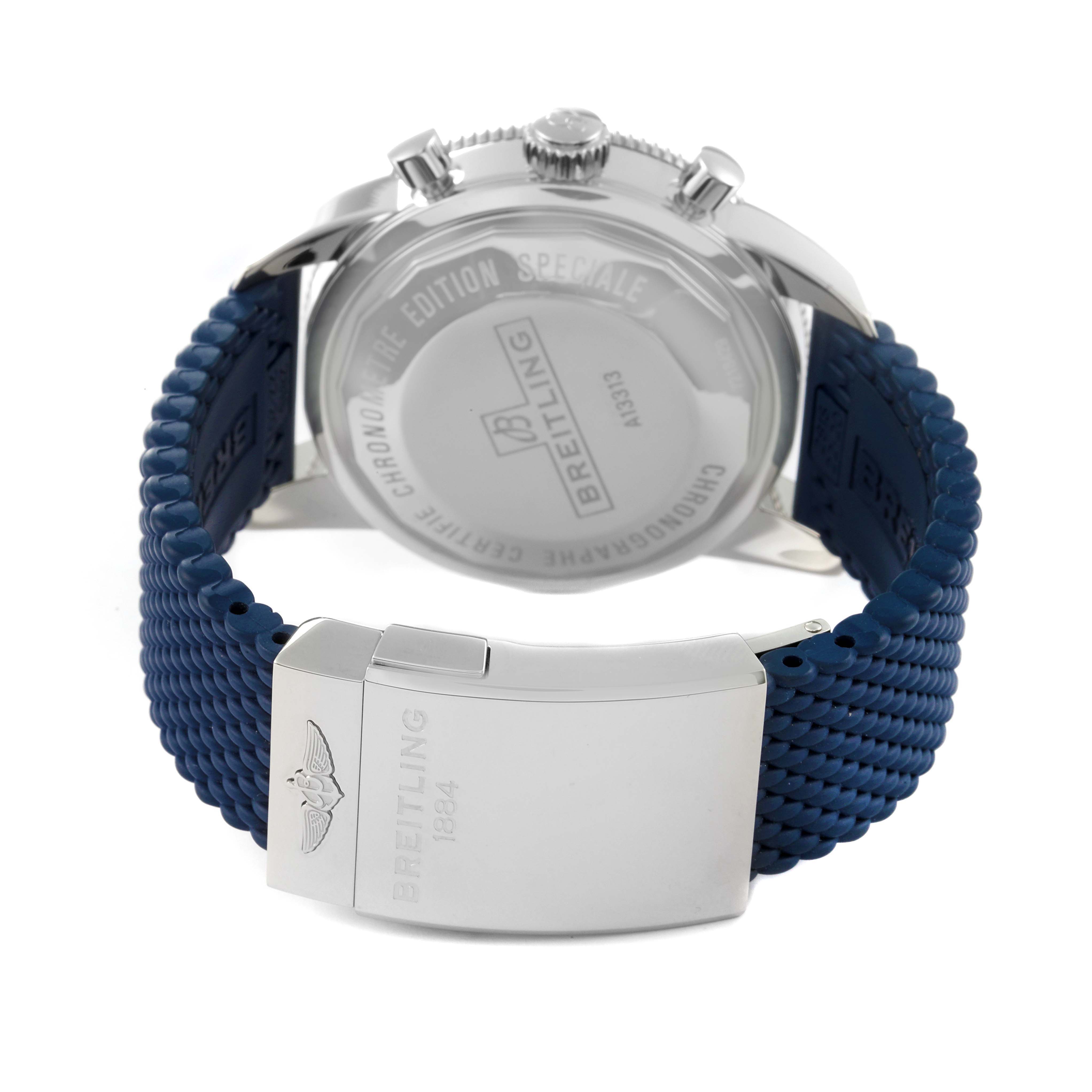 The image shows the back view of a Breitling Superocean A13313 Men's Stainless Steel Blue Dial A13313 Men's Stainless Steel Blue Dial watch, featuring its case back and blue rubber strap with a clasp.