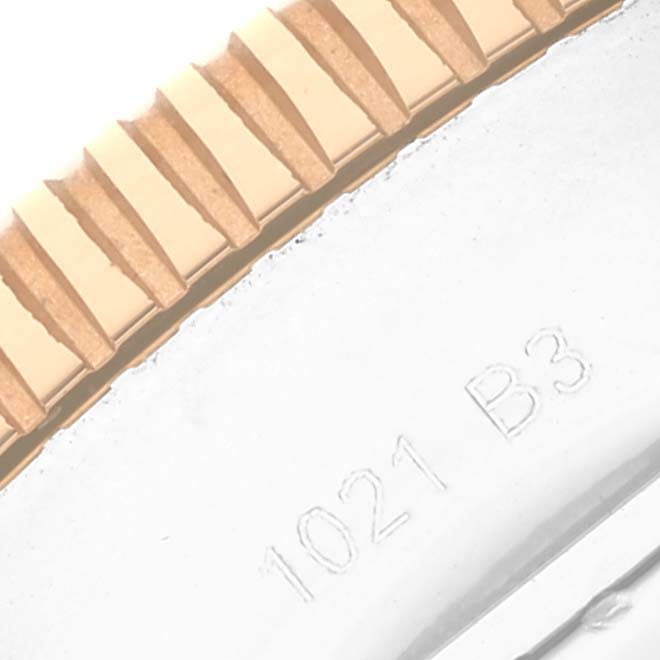 A close-up image of the Breitling Superocean U1331312/BG50/279S/A20D.4 Men's Steel and Gold (two tone) Black Dial U1331312/BG50/279S/A20D.4 Men's Steel and Gold (two tone) Black Dial model shows a portion of the caseback and the bronze bezel.