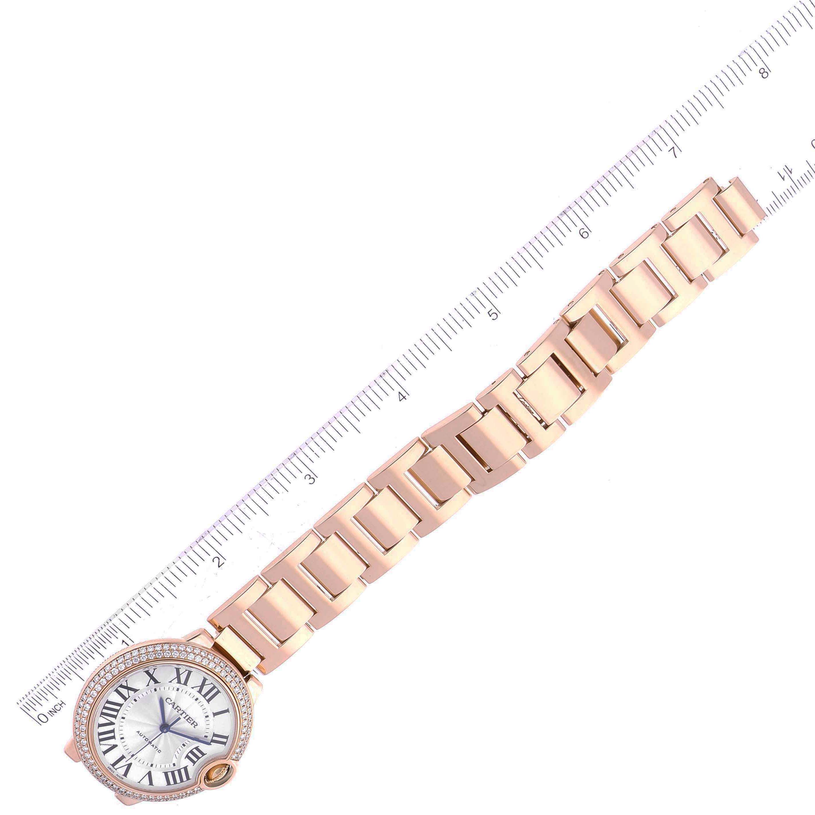 This image shows the face and strap of a Cartier Ballon Bleu WE9005Z3 Women's Rose Gold Blue Dial WE9005Z3 Women's Rose Gold Blue Dial watch, measured alongside a ruler.