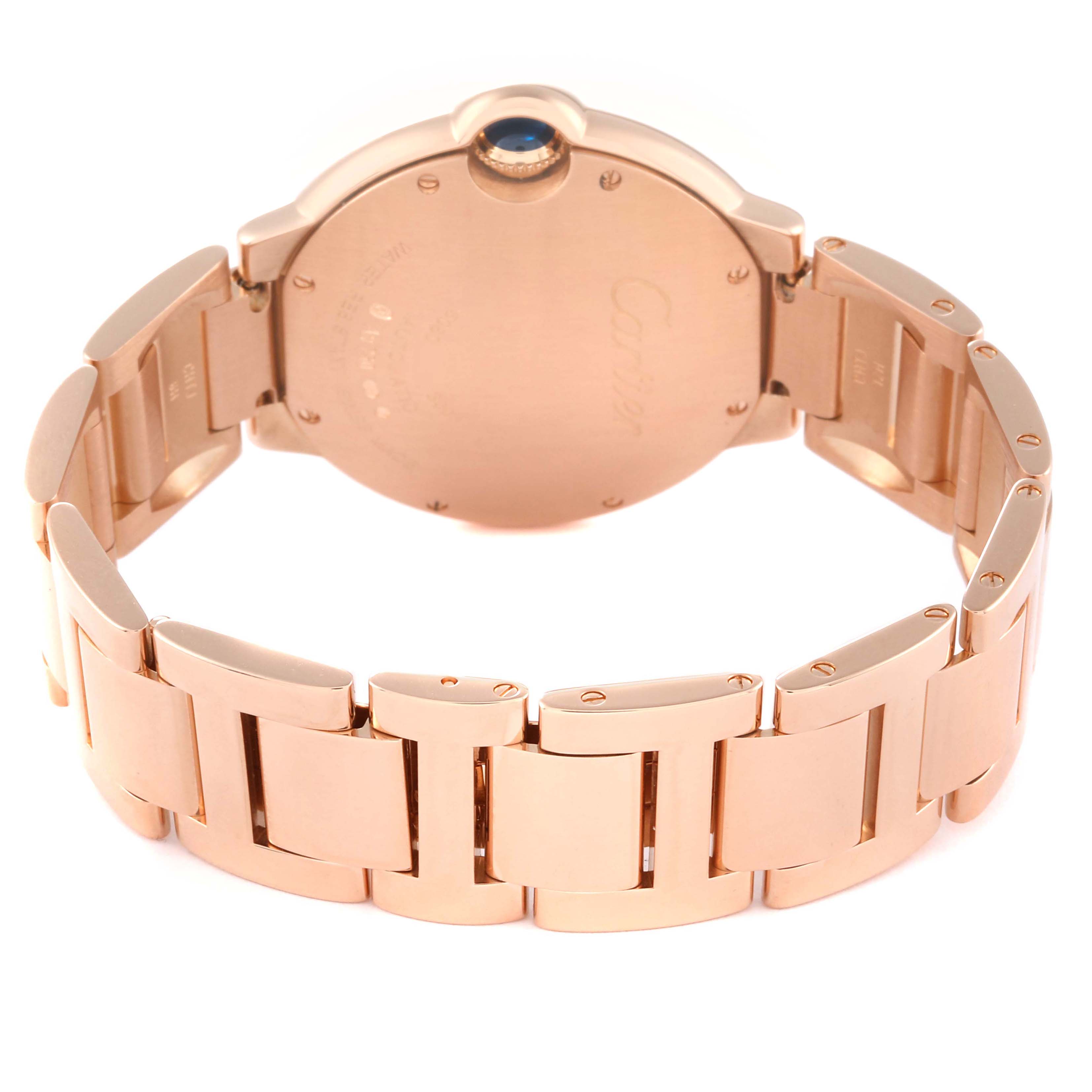 The image shows the backside of the Cartier Ballon Bleu WE9005Z3 Women's Rose Gold Blue Dial WE9005Z3 Women's Rose Gold Blue Dial watch, focusing on the bracelet and case back.