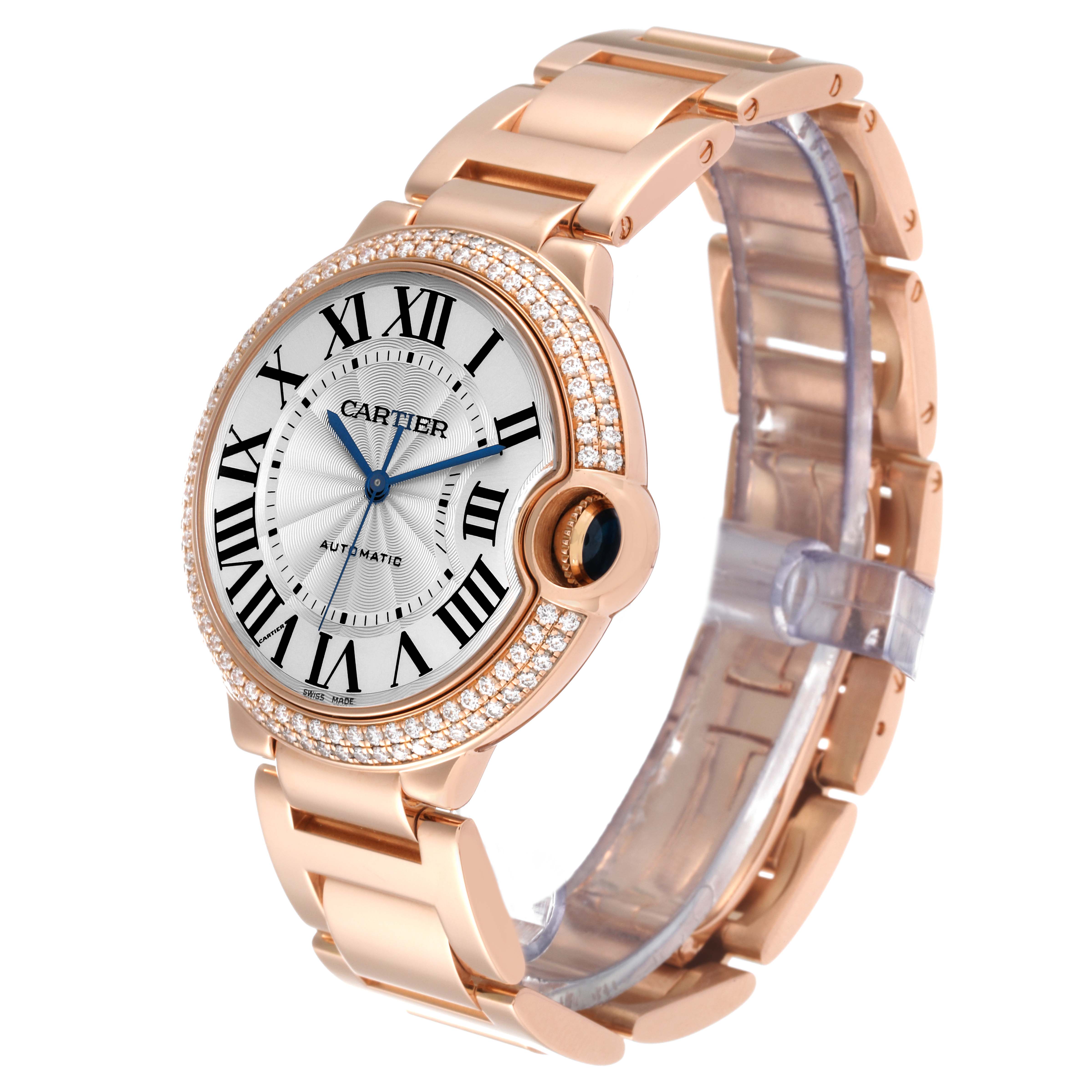 The Cartier Ballon Bleu WE9005Z3 Women's Rose Gold Blue Dial WE9005Z3 Women's Rose Gold Blue Dial watch is shown at an oblique angle, highlighting the face, bracelet, and diamond-encrusted bezel.